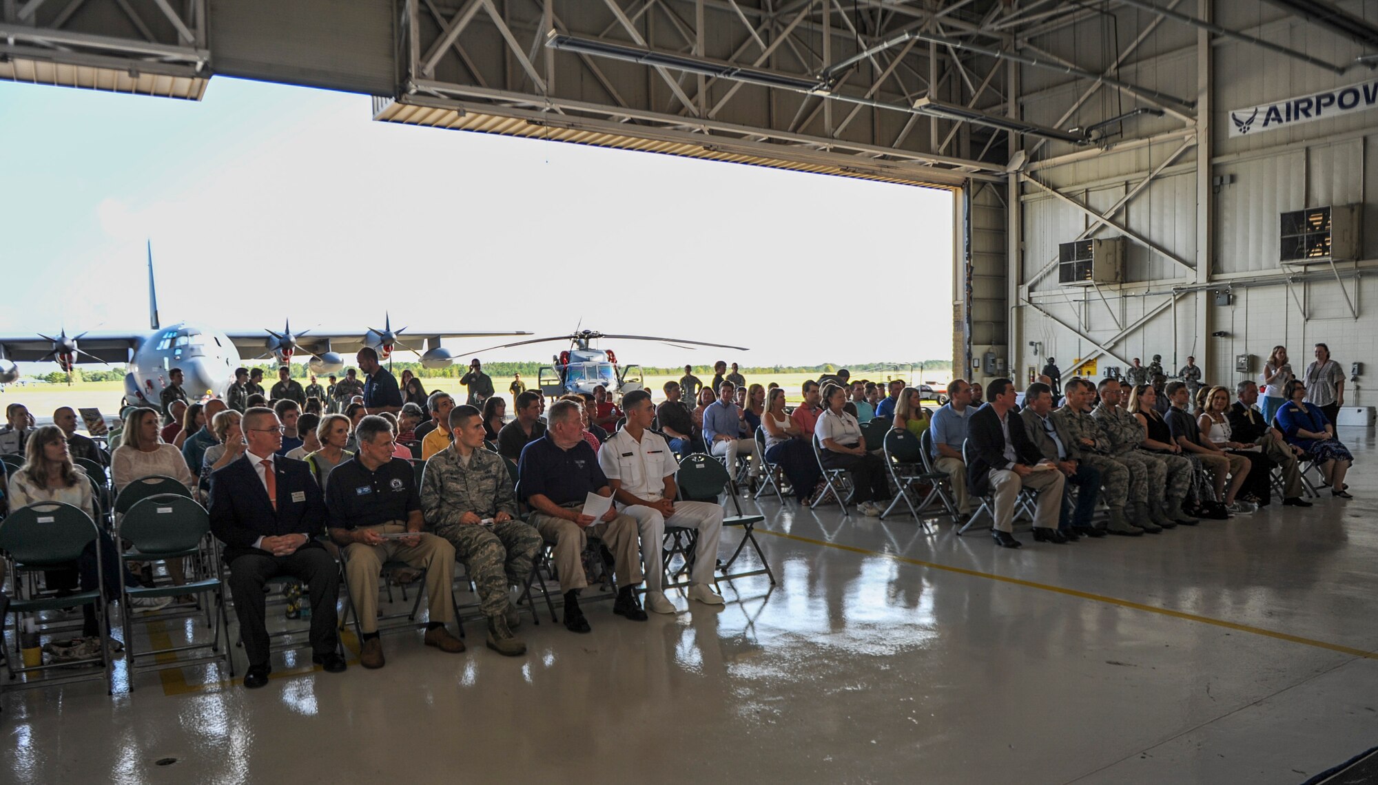 More than 150 high school students, parents, and counselors listen to representatives from the U.S. service academies about their different admission requirements during the 2014 Military Service Academy Day Sept. 13, at Moody Air Force Base, Ga.  Academy representatives from the U.S. Air Force Academy in Colorado Springs, Colo., the U.S. Naval Academy in Annapolis, Md., the U.S. Military Academy in West Point, the U.S. Merchant Marine Academy in Kings Point,  and the U.S. Coast Guard Academy in New London, Ct., were present to provide information and answer questions about the application and admissions process. (U.S. Air Force photo by Andrea Jenkins)
