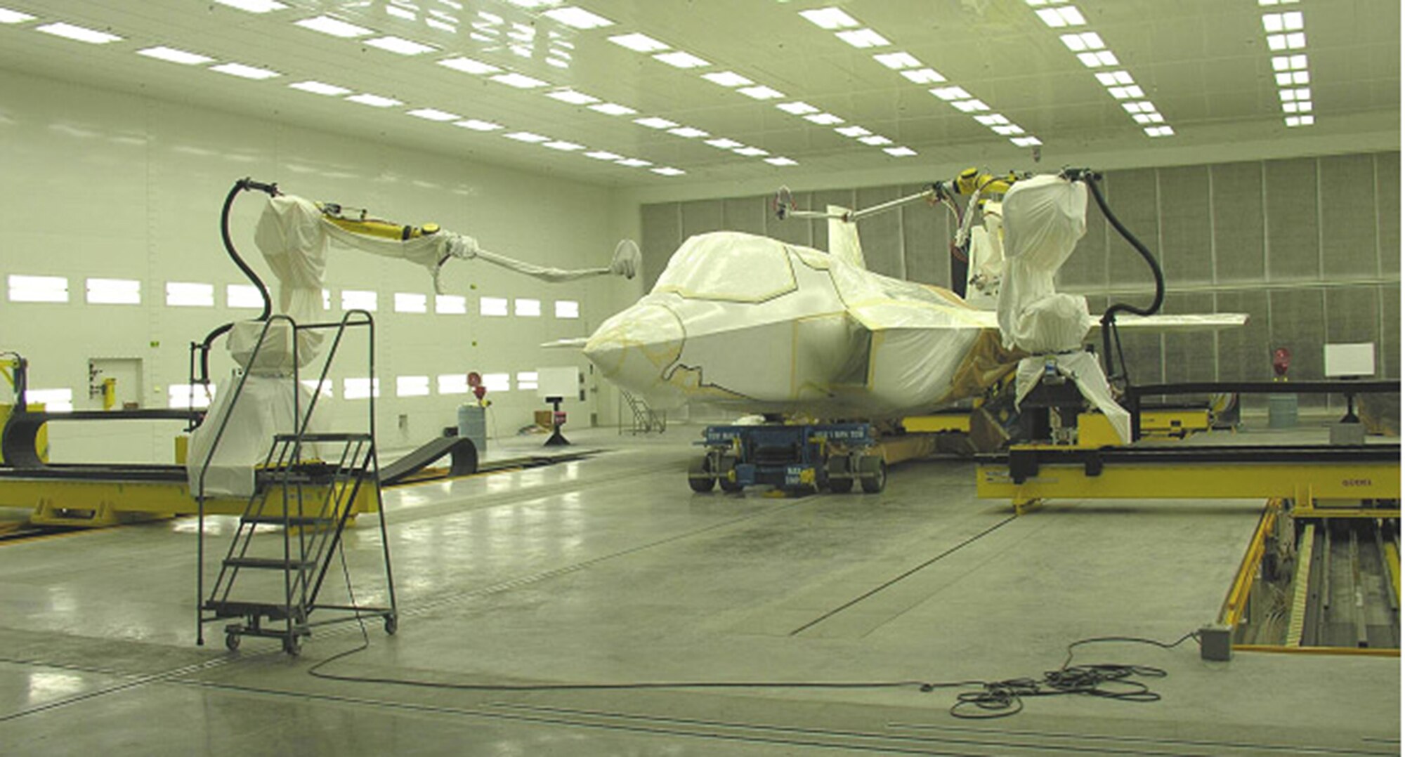 The Air Force is taking action to reduce and eliminate pollution across all mission areas. The Air Force Life Cycle Management Center F-35 Environmental, Safety and Occupational Health Support Team at Wright-Patterson, Ohio, spearheaded a successful field service evaluation of an innovative corrosion-resistant coating for the new F-35 Lightning II fighter jet, which has many environmental benefits including a reduction in hazardous materials usage, as well as lower air emissions and fuel consumption.  (Courtesy photo)