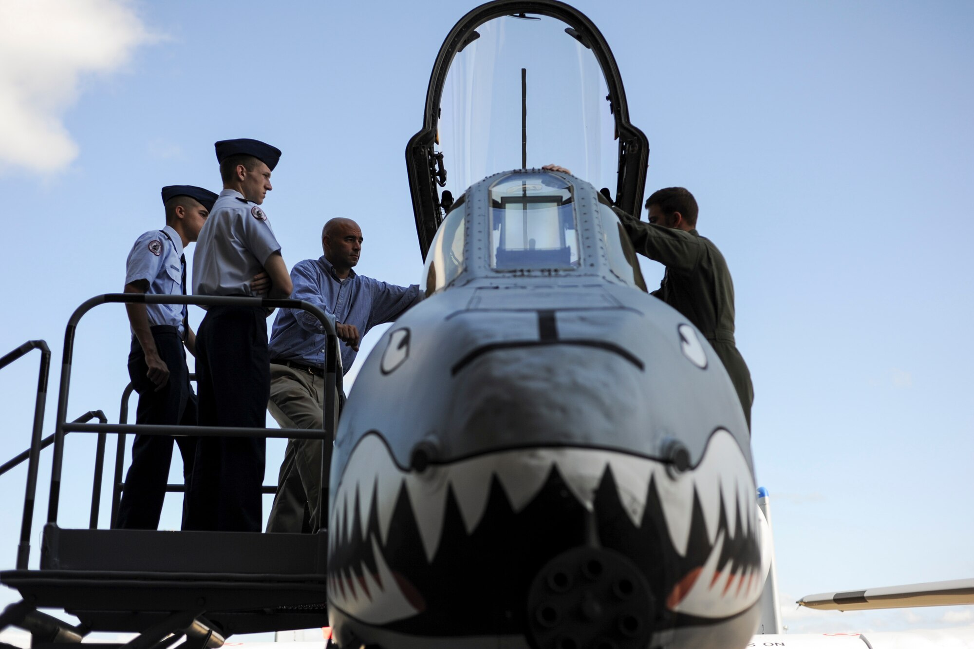An A-10C Thunderbolt II pilot explains the aircraft’s mission and capabilities to attendees during the 2014 Military Service Academy Day Sept. 13, at Moody Air Force Base, Ga. Many of Moody’s officers, who graduated from the U.S. Air Force Academy, participated in the event to give first-hand accounts of their experiences attending a service academy. (U.S. Air Force photo by Andrea Jenkins)
