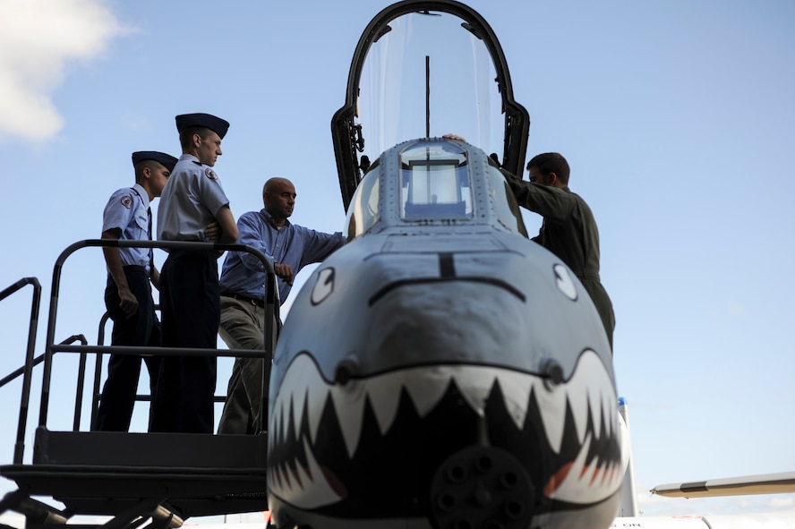 An A-10C Thunderbolt II pilot explains the aircraft’s mission and capabilities to attendees during the 2014 Military Service Academy Day Sept. 13, at Moody Air Force Base, Ga. Many of Moody’s officers, who graduated from the U.S. Air Force Academy, participated in the event to give first-hand accounts of their experiences attending a service academy. (U.S. Air Force photo by Andrea Jenkins)
