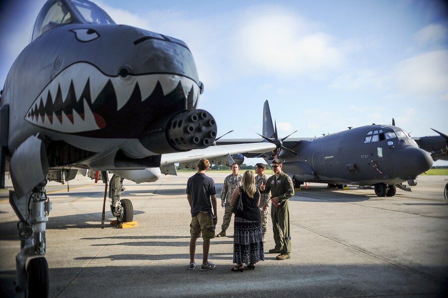 Team Moody Airmen talk to attendees of the 2014 Military Service Academy Day, Sept. 13, at Moody Air Force Base, Ga. More than 150 high school students and families had the opportunity to tour static aircraft during the event. (U.S. Air Force photo by Andrea Jenkins)
