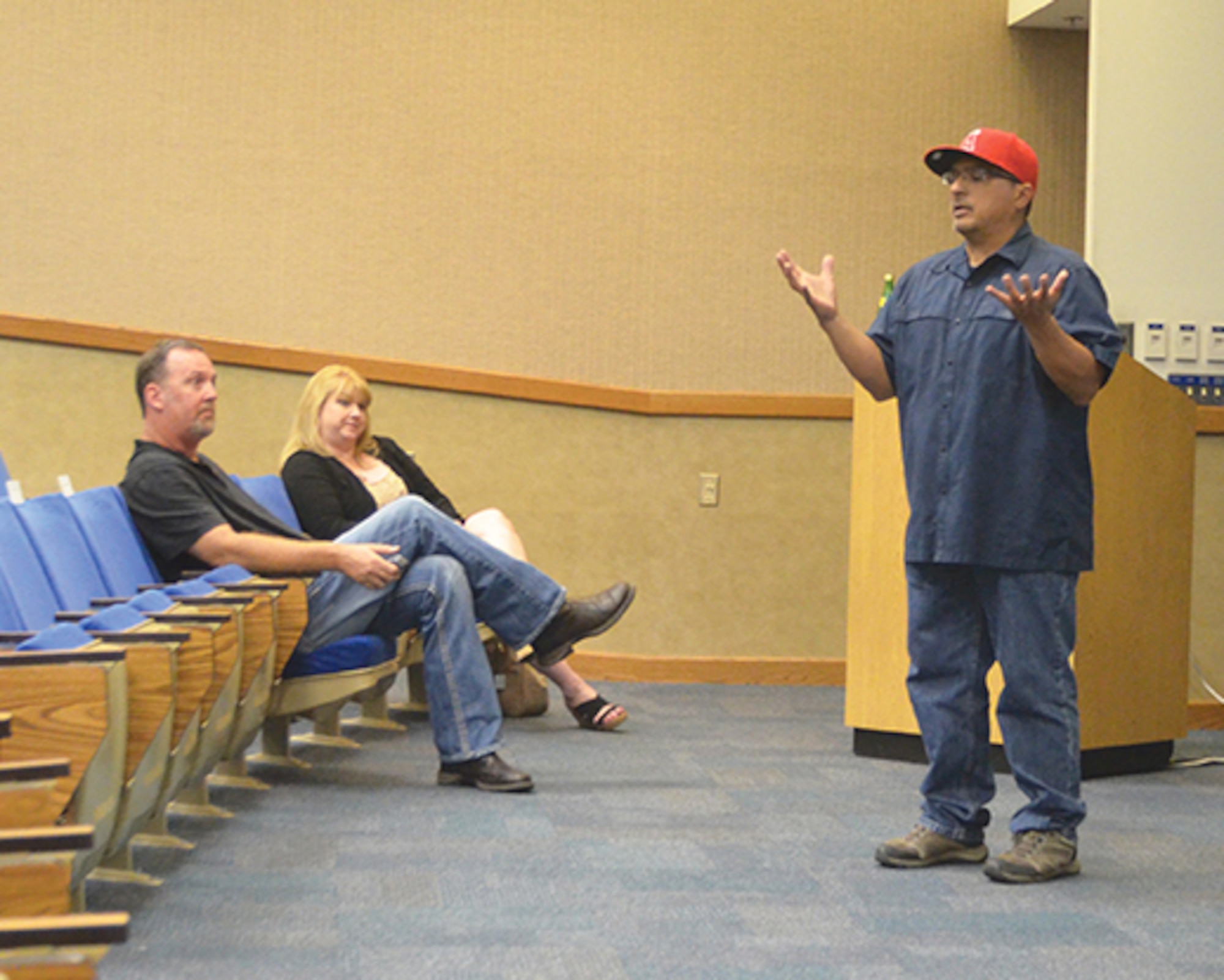 Albuquerque Police Sgt. Mizel Garcia gives crime prevention advice at the 377th Air Base Wing Presentation Center Sept. 5. (Photo by Lee Ross)