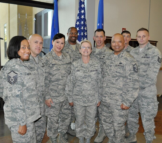 TRAVIS AIR FORCE BASE, Calif. -- The super recruiting team of the 349th Air Mobility Wing,  are just nine of 106 recruiters in the Western Recruiting Squadron. The WRS covers 10 states, including Alaska and Hawaii. Pictured from the left front row, are: Master Sergeants Michaela Brown, John Erzen, Alisa Merriott, Rhonda Cano, James Muna, and Tech. Sgt. Jeffrey Madden. Back row, from the left: Flight Chief, Senior Master Sgt. Alexander Brown, and TSgts. Bill Pullion and Robert
Thames. The team not only surpassed their accessions goal for fiscal year
2014, they garnered many awards along the way. (U.S. Air Force photo/Ellen
Hatfield)