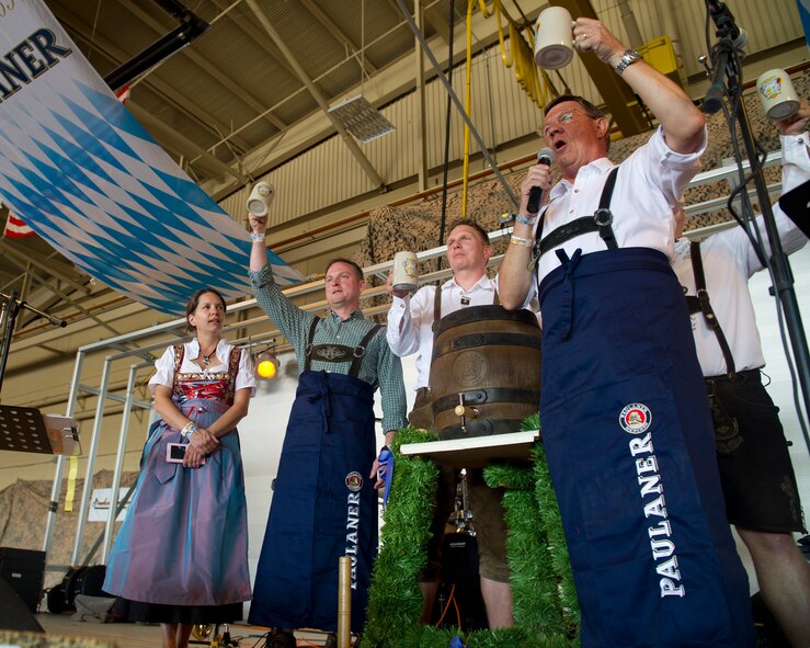 Colonel Robert Kiebler, 49th Wing commander, and Col. Heinz J. Ferkinghoff, German Air Force Flying Training Center commander, toast kicking off the 18th annual Oktoberfest at Holloman Air Force Base, N.M., Sept. 12. The GAFFTC welcomed Team Holloman and members of the community to experience this aspect of German heritage, including food, drinks and good company. (U.S. Air Force photo by Senior Airman Leah Ferrante/Released)