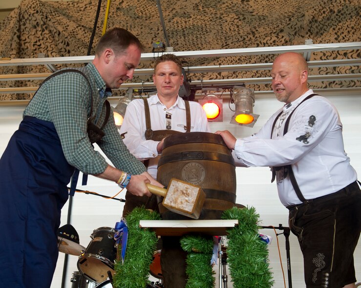 Colonel Robert Kiebler, 49th Wing commander, performs the tapping of the keg during the opening ceremony, kicking off the 18th annual Oktoberfest at Holloman Air Force Base, N.M., Sept. 12. “It is one team here at Holloman, and we are all in it together,” said Kiebler. “Thank you for hosting and sharing a little bit of German tradition with us.” The German Air Force Flying Training Center welcomed Team Holloman and members of the community to experience this aspect of German heritage, including food, drinks and good company. (U.S. Air Force photo by Senior Airman Leah Ferrante/Released)