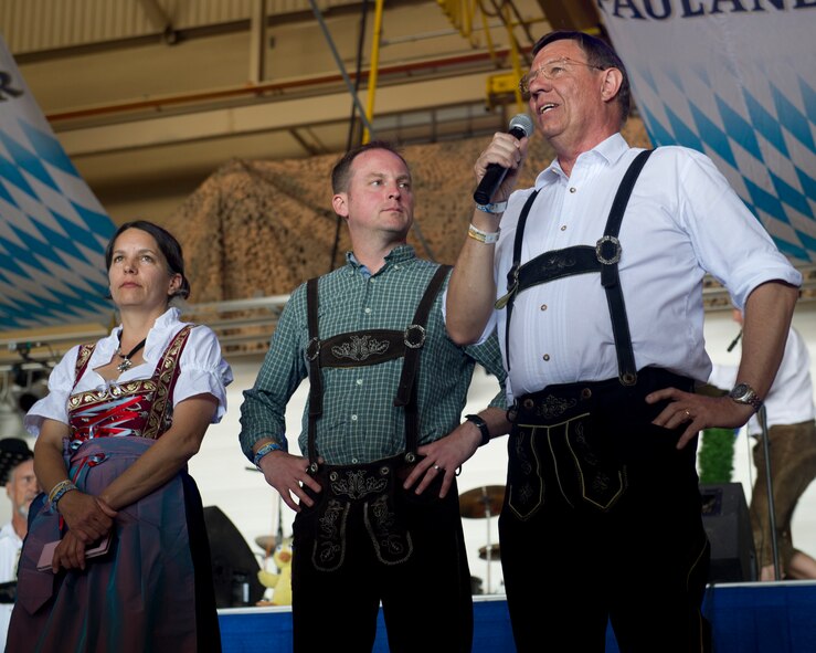 Colonel Heinz J. Ferkinghoff, German Air Force Flying Training Center commander, gives opening remarks with Col. Robert Kiebler, 49th Wing commander, kicking off the 18th annual Oktoberfest at Holloman Air Force Base, N.M., Sept. 13. “It is a great cooperation between the Germans and the United States Air Force at Holloman,” said Ferkinghoff. “If the Germans and Americans didn’t work together there wouldn’t be such an event.” The GAFFTC welcomed Team Holloman and members of the community to experience this aspect of German heritage, including food, drinks and good company. (U.S. Air Force photo by Senior Airman Leah Ferrante/Released)
