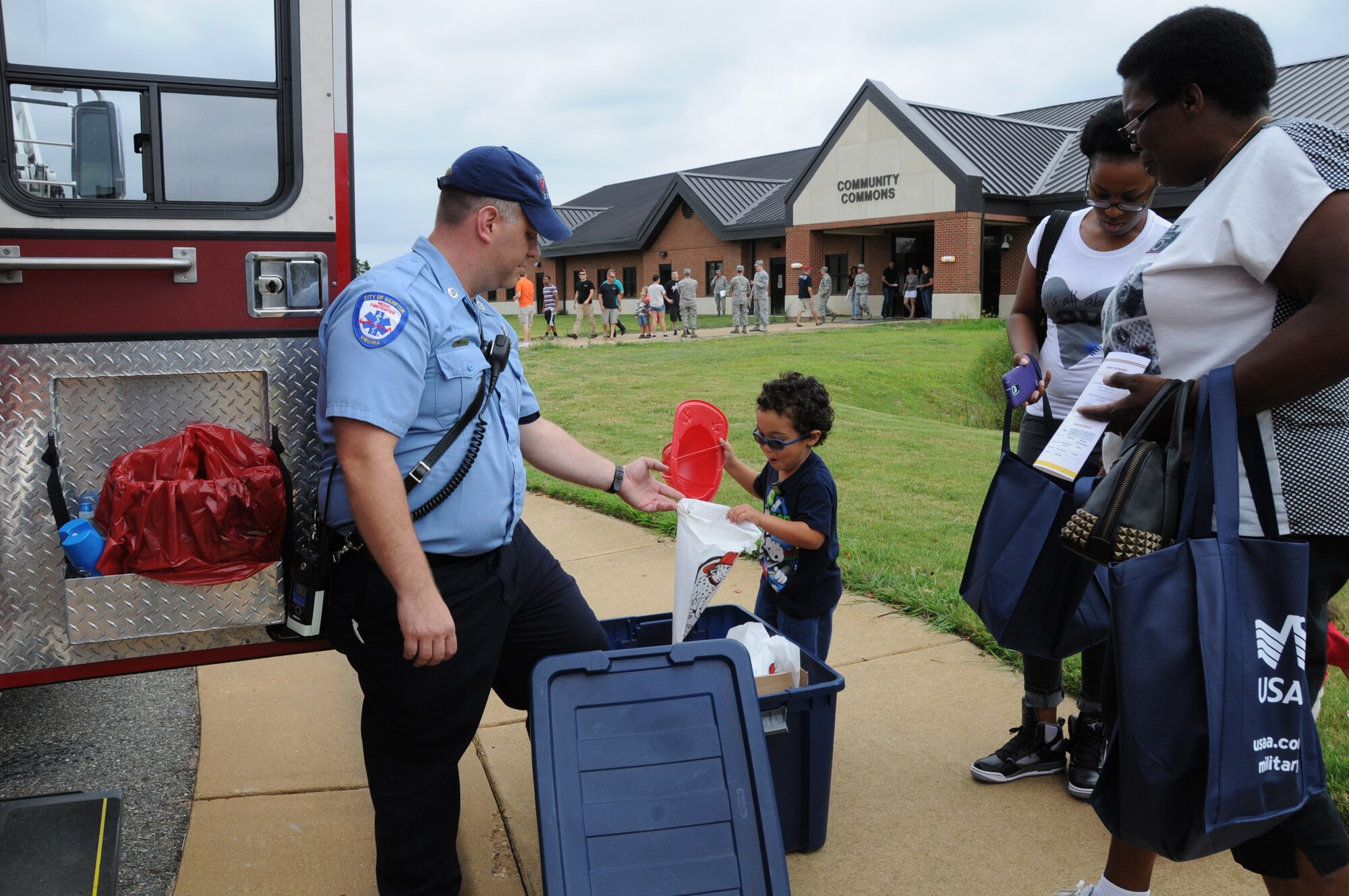 About 1500 service members and their families participated in the Virginia Air National Guard Wingman Day and Family Day events during a unit training assembly weekend planned to accomplish training requirements and promote camaraderie on Langley Air Force Base, Sept. 7, 2014.  192nd Fighter Wing Guardsmen participated in sexual assault prevention, relationship, resiliency and force protection training during the first half of Sunday.  The second half focused on family activities that included games for children, DJ music, Hawaiian performers, food, family resource booths, financial classes and a commander’s dunk tank. (U.S. Air National Guard photo by Master Sgt. Carlos J. Claudio/Released)