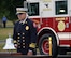 Westover Assistant Fire Chief David Benedetti tolls the bell, three sets of five, during the 9/11 Remembrance Ceremony at the base flag pole, Sept. 11, 2014. Long before telephones and radios, fire departments used the telegraph to communicate so when a firefighter died in the line of duty, the fire alarm office would tap out a special signal. That signal was five measured dashes, pause, five measured dashes, pause, then five final dashes. This became universally known as the Tolling of the Bell and is now used as a sign of honor and respect for all firefighters who had made the ultimate sacrifice. (U.S. Air Force photo/SSgt. Kelly Goonan)