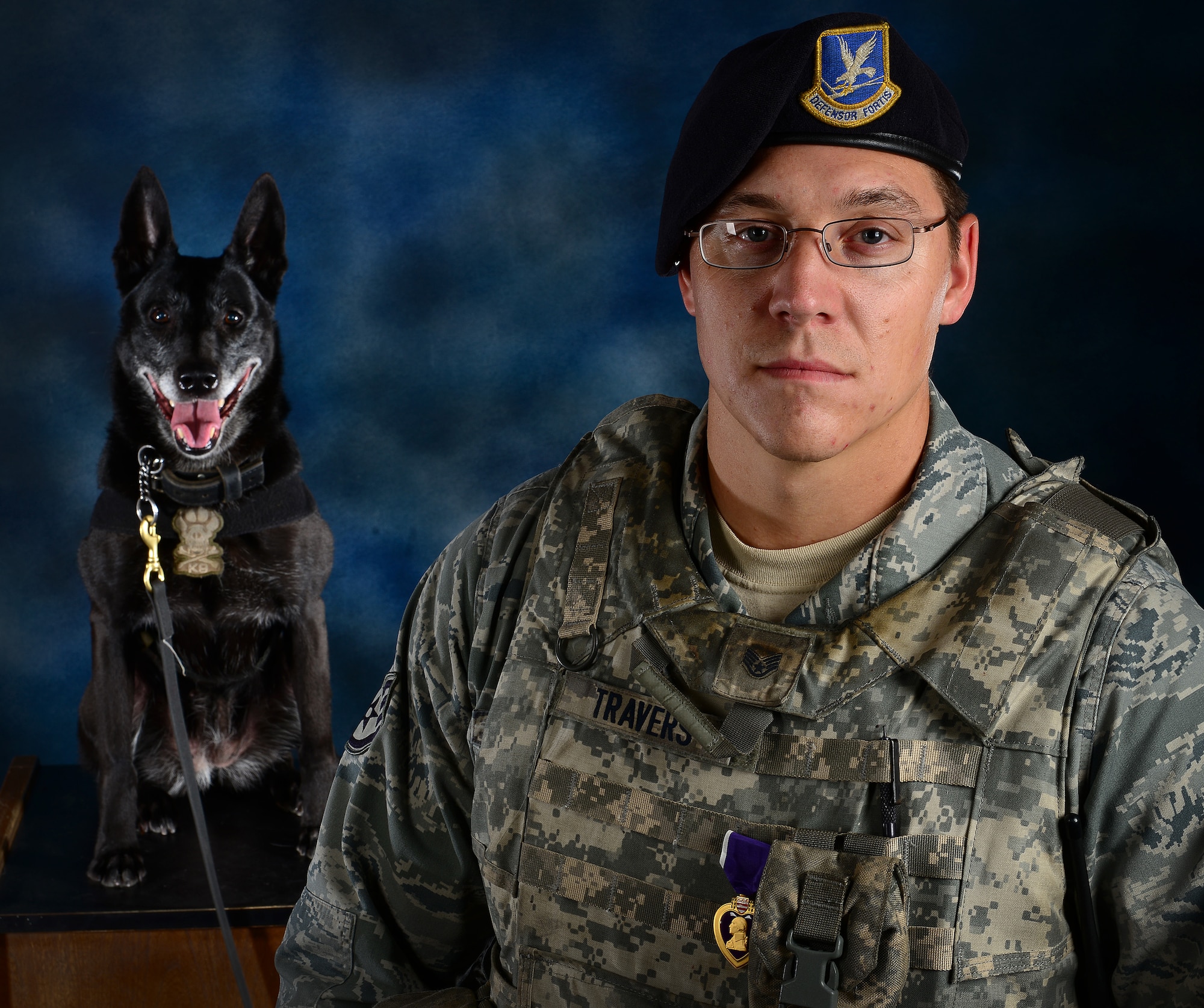 During a deployment to Kandahar Airfield, Afghanistan, in 2012, Staff Sgt. Gabriel Travers, 31st Security Forces Squadron K-9 handler, suffered a traumatic brain injury. Two years later, Travers was presented the oldest honor given to service members for wounds received in combat, the Purple Heart. (U.S. Air Force photo/Senior Airman Matthew Lotz)