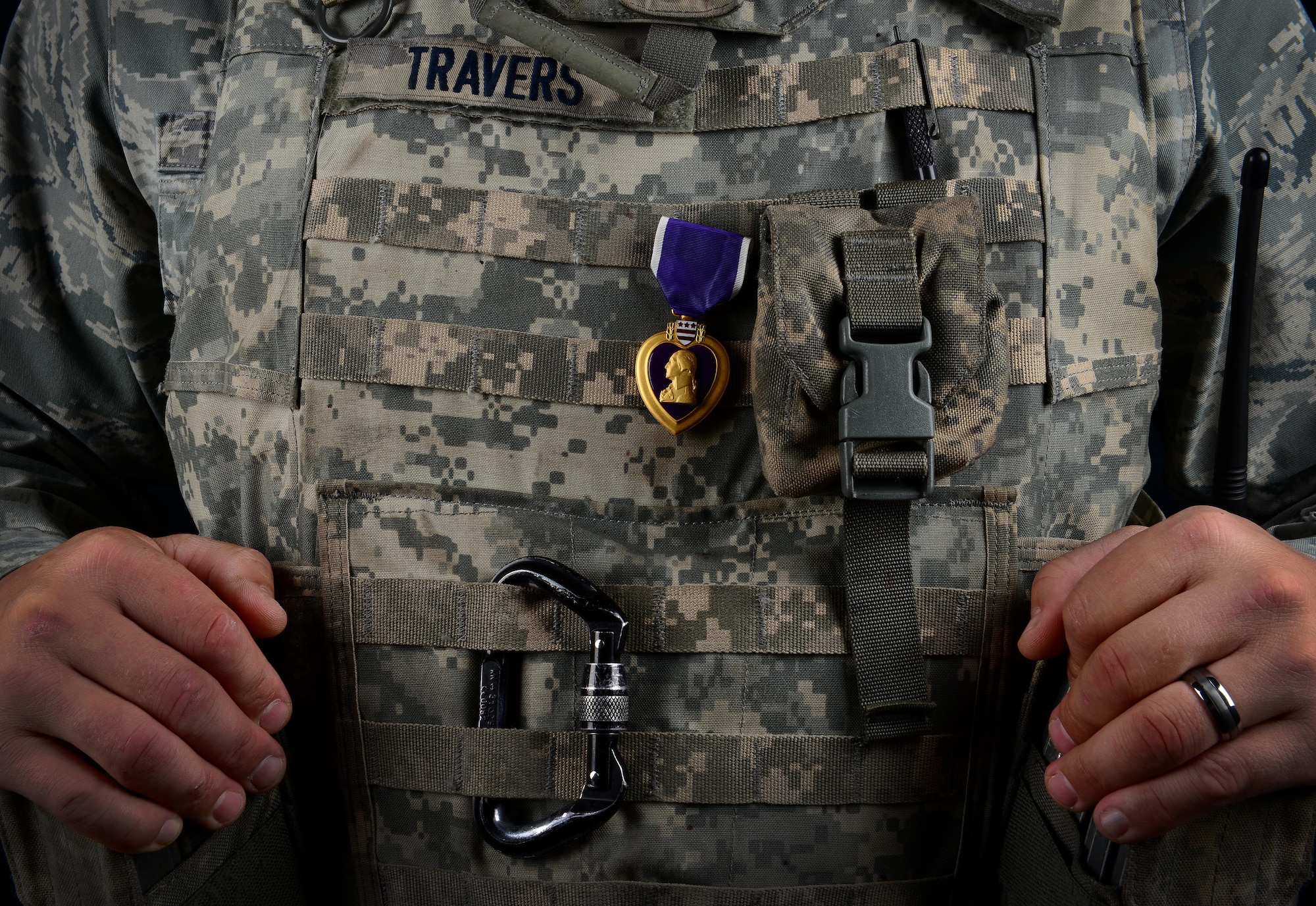 During a deployment to Kandahar Airfield, Afghanistan, in 2012, Staff Sgt. Gabriel Travers, 31st Security Forces Squadron K-9 handler, suffered a traumatic brain injury. Two years later, Travers was presented the oldest honor given to service members for wounds received in combat, the Purple Heart. (U.S. Air Force photo/Senior Airman Matthew Lotz)