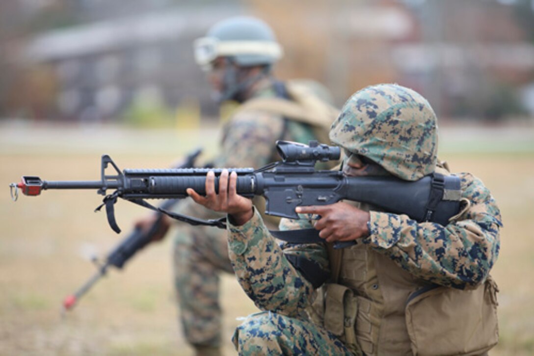 U.S. Marines, with Headquarters and Service(H+S) Company, Marine Corps Combat Service Support Schools, set in on the defense after disembarking from a CH-53 Sea Stallion aboard Camp Johnson, N.C., November 22, 2013.  The Marines with H+S Company were participating in a two day field exercise in order to maintain competency in Marine Corps combat skills. (U.S. Marine Corps photo by SSgt David J. Rakes Sr./Released)
