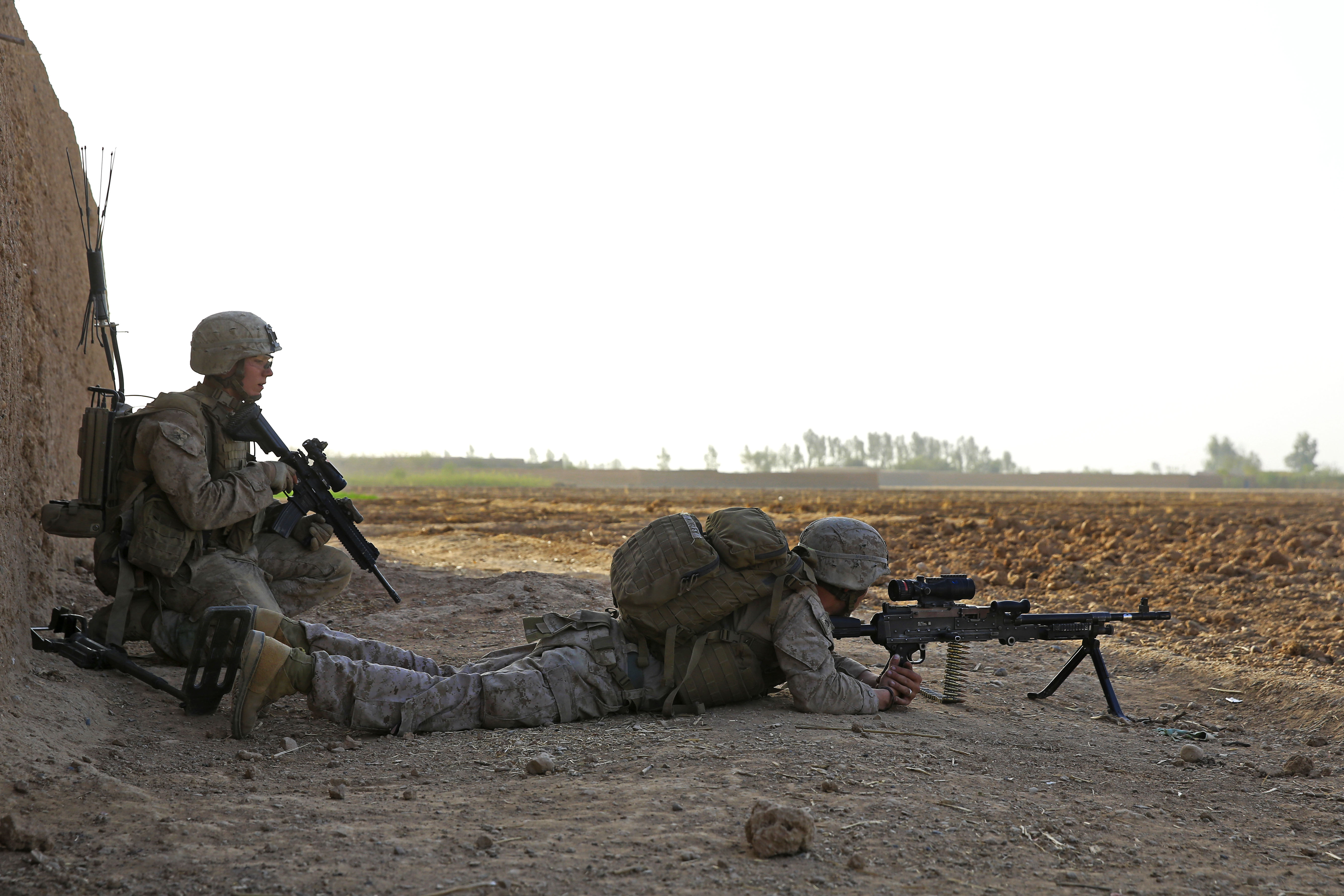 U.S. Marine Corps Lance Cpl. Michael Hughes, left, and U.S. Marine