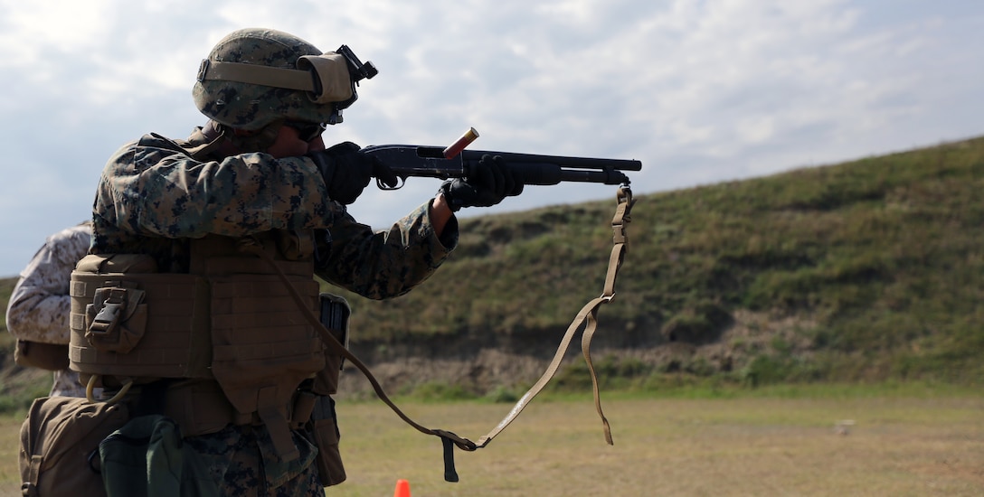 A Marine with Black Sea Rotational Force 14 fires on a target using 12-gauge ammunition Sept. 8, during a non-lethal weapons range near Mihail Kogalniceanu Air Base, Romania. The Mossberg 590A1 is used in non-lethal weapons training with Eastern European partner nations in the Black Sea, Balkan and Caucasus region. (U.S. Marine Corps photo by Lance Cpl. Ryan Young/released)