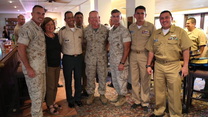 Major Gen. Vincent A. Coglianese, 1st Marine Logistics Group Commanding General, Brig. Gen. Leonardo Pinto Morales, commander of the 7th Division of the Colombian Army, Maj. Gen. Lawrence D. Nicholson, 1st Marine Division commanding general, Col. Phil Frietze, G-3 operations officer, 1st MLG, and other leaders within the Colombian Armed Forces pose for a picture as part of the Colombian Observance Exchange Program Sept. 2, 2014 aboard Camp Pendleton, Calif. More than thirty officers of the Colombian School of Advanced Warfighting visited 1st MLG to allow members of both the U.S. Marine Corps and Colombian Armed Forces to build an understanding of services, share best practices and strengthen camaraderie and interoperability. 