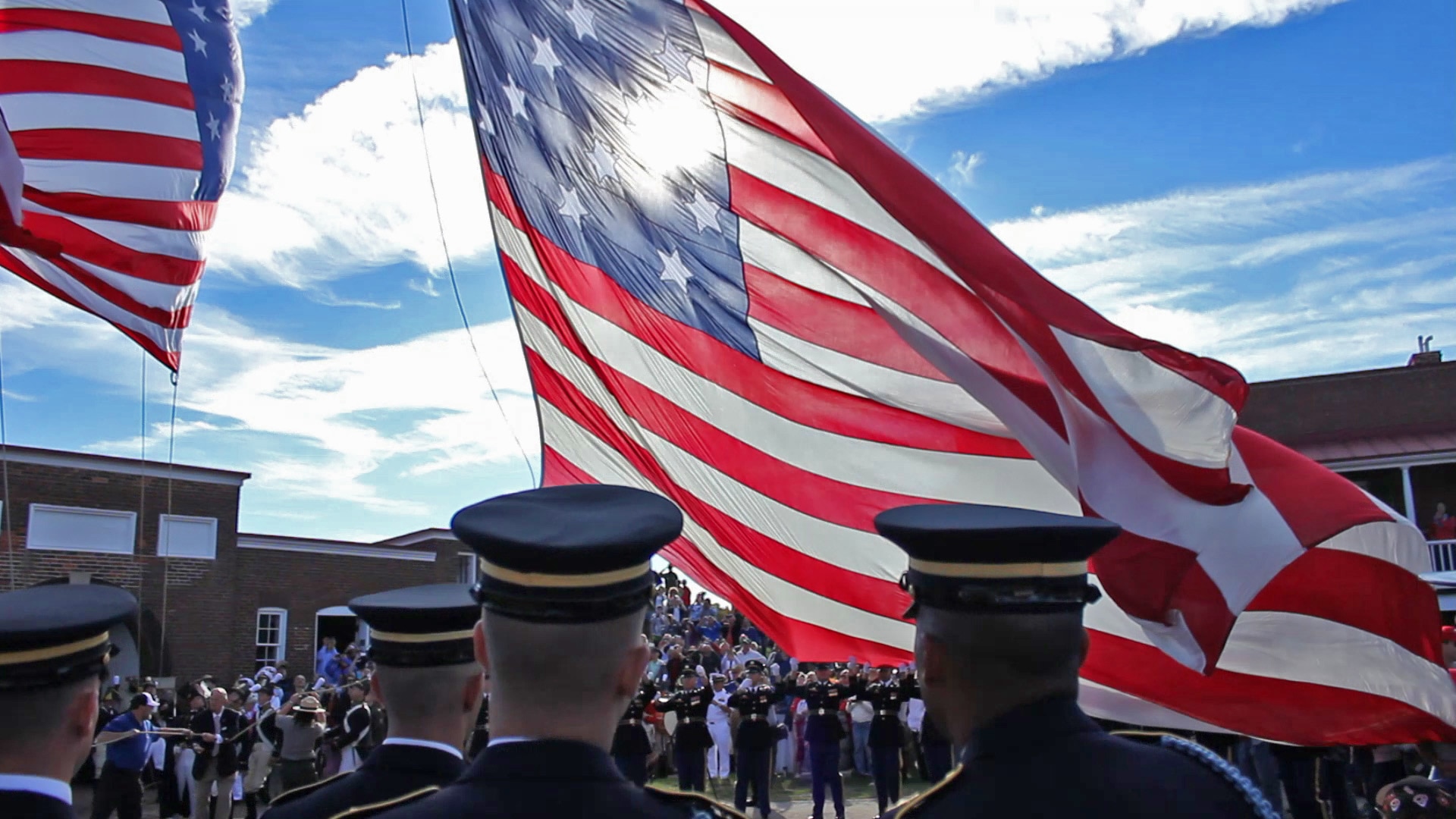 Soldiers from the U.S. Army 3rd Infantry Regiment "Old Guard" unfurl and raise a hand-stitched replica of the 15-star, 15-stripe flag to commemorate the 200th anniversary of the defense of Fort McHenry, Sept. 14, 1814. The ascent of the stars and stripes would inspire 1st Lt. Francis Scott Key of the District of Columbia Militia to pen the immortal words that would become the national anthem. The flag was raised at exactly the same day and time as it was 200 years ago during the War of 1812.