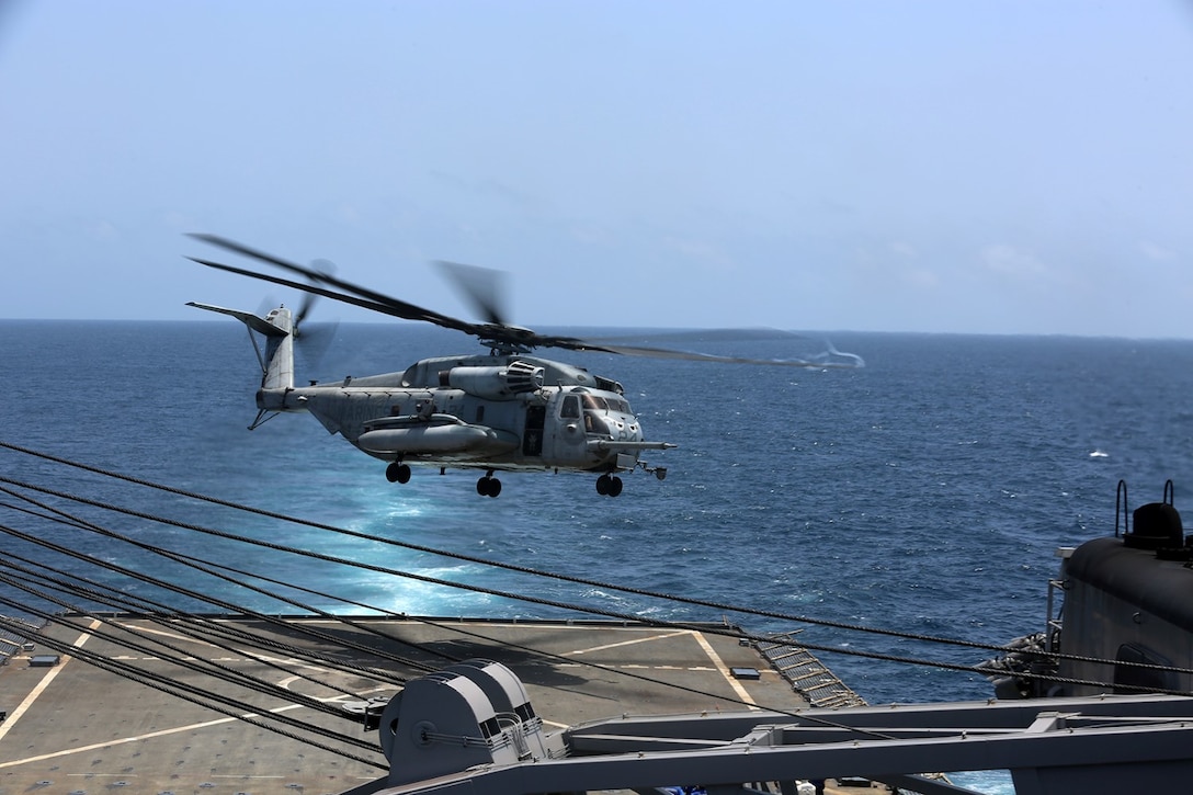 A CH-53E Super Stallion with Marine Medium Tiltrotor Squadron 163 (Reinforced), 11th Marine Expeditionary Unit, takes off from the flight deck of the USS Comstock, Sept. 12. The USS Comstock is part of the Makin Island Amphibious Ready Group and, with the embarked 11th MEU is deployed in support of maritime security operations and theater security cooperation efforts in the U.S. 5th Fleet area of responsibility. (U.S. Marine Corps photo by Sgt. Melissa Wenger/ Released)