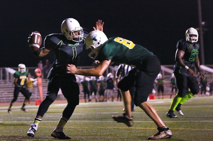 The Headquarters and Support Battalion Spartans beat the School of Infantry Outlaws, 13-7 in a hard fought, low-scoring, back-and-forth game. That brought the Spartans to a 2-1 record for the season at the Paige Fieldhouse football field, Sept. 15.