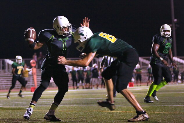 The Headquarters and Support Battalion Spartans beat the School of Infantry Outlaws, 13-7 in a hard fought, low-scoring, back-and-forth game. That brought the Spartans to a 2-1 record for the season at the Paige Fieldhouse football field, Sept. 15.