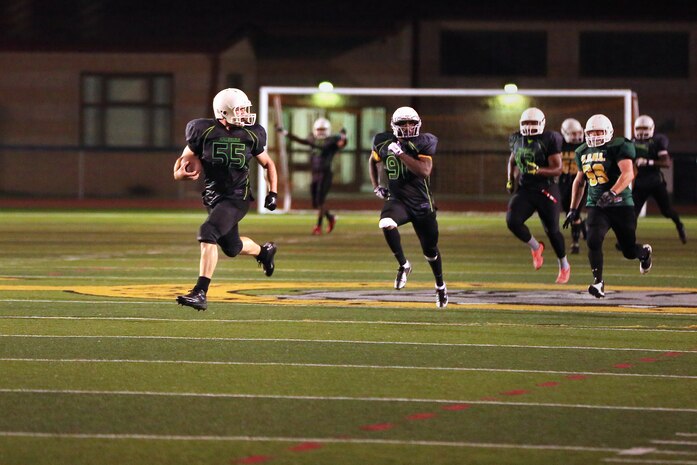 The Headquarters and Support Battalion Spartans beat the School of Infantry Outlaws, 13-7 in a hard fought, low-scoring, back-and-forth game. That brought the Spartans to a 2-1 record for the season at the Paige Fieldhouse football field, Sept. 15.