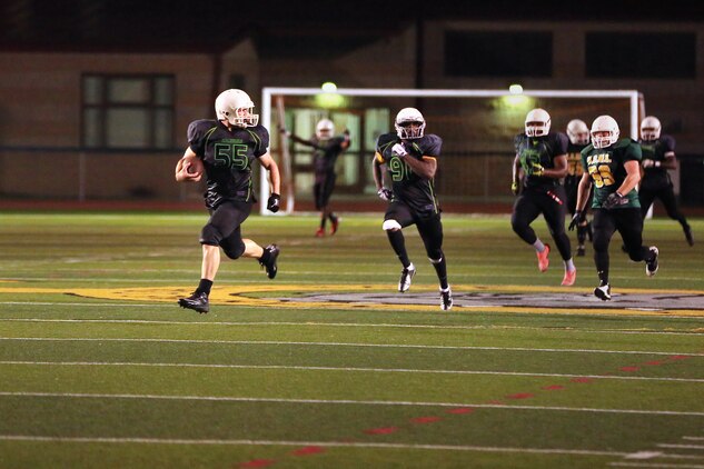 The Headquarters and Support Battalion Spartans beat the School of Infantry Outlaws, 13-7 in a hard fought, low-scoring, back-and-forth game. That brought the Spartans to a 2-1 record for the season at the Paige Fieldhouse football field, Sept. 15.