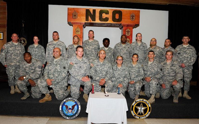 Joint Task Force-Bravo welcomed the newest members of the Non-Commissioned Officer Corps for the U. S. Army and Air Force in their first-ever joint NCO induction ceremony September 5, 2014.  Twenty-five NCOs from the Army Forces Battalion and Medical Element took part in the time-honored tradition symbolizing their change from a follower to a leader for current and future service members.  (Photo by Martin Chahin)