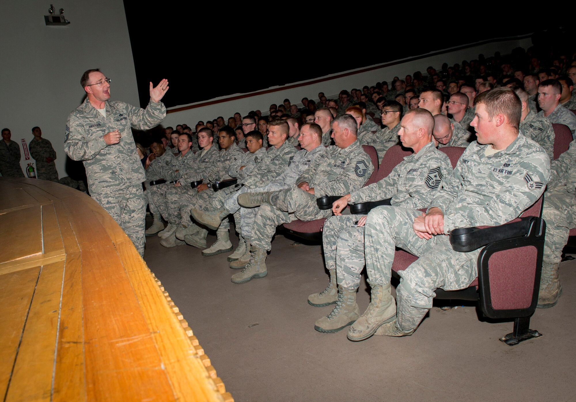 Chief Master Sgt. Marty Anderson, 8th Air Force command chief master sergeant, speaks to enlisted members on Minot Air Force Base, N.D., Sept. 15, 2014. Anderson visited the base to provide information on new initiatives and answer questions enlisted members may have on the new evaluation system. (U.S. Air Force photo/Airman 1st Class Sahara L. Fales)