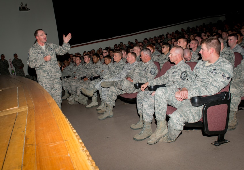 Chief Master Sgt. Marty Anderson, 8th Air Force command chief master sergeant, speaks to enlisted members on Minot Air Force Base, N.D., Sept. 15, 2014. Anderson visited the base to provide information on new initiatives and answer questions enlisted members may have on the new evaluation system. (U.S. Air Force photo/Airman 1st Class Sahara L. Fales)