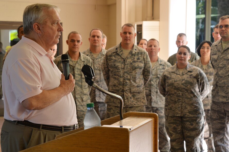 Chief Master Sgt. (ret) James C. Binnicker, the ninth Chief Master Sergeant of the Air Force, speaks with Pacific Air Forces Airmen during a base tour Sept. 10, 2014, at Joint Base Pearl Harbor-Hickam, Hawaii. Binnicker toured the 15th Wing and PACAF for several days before attending the PACAF 67th Birthday Ball as the special guest speaker Sept. 13. (U.S. Air Force photo by Staff Sgt. Alexander Martinez)