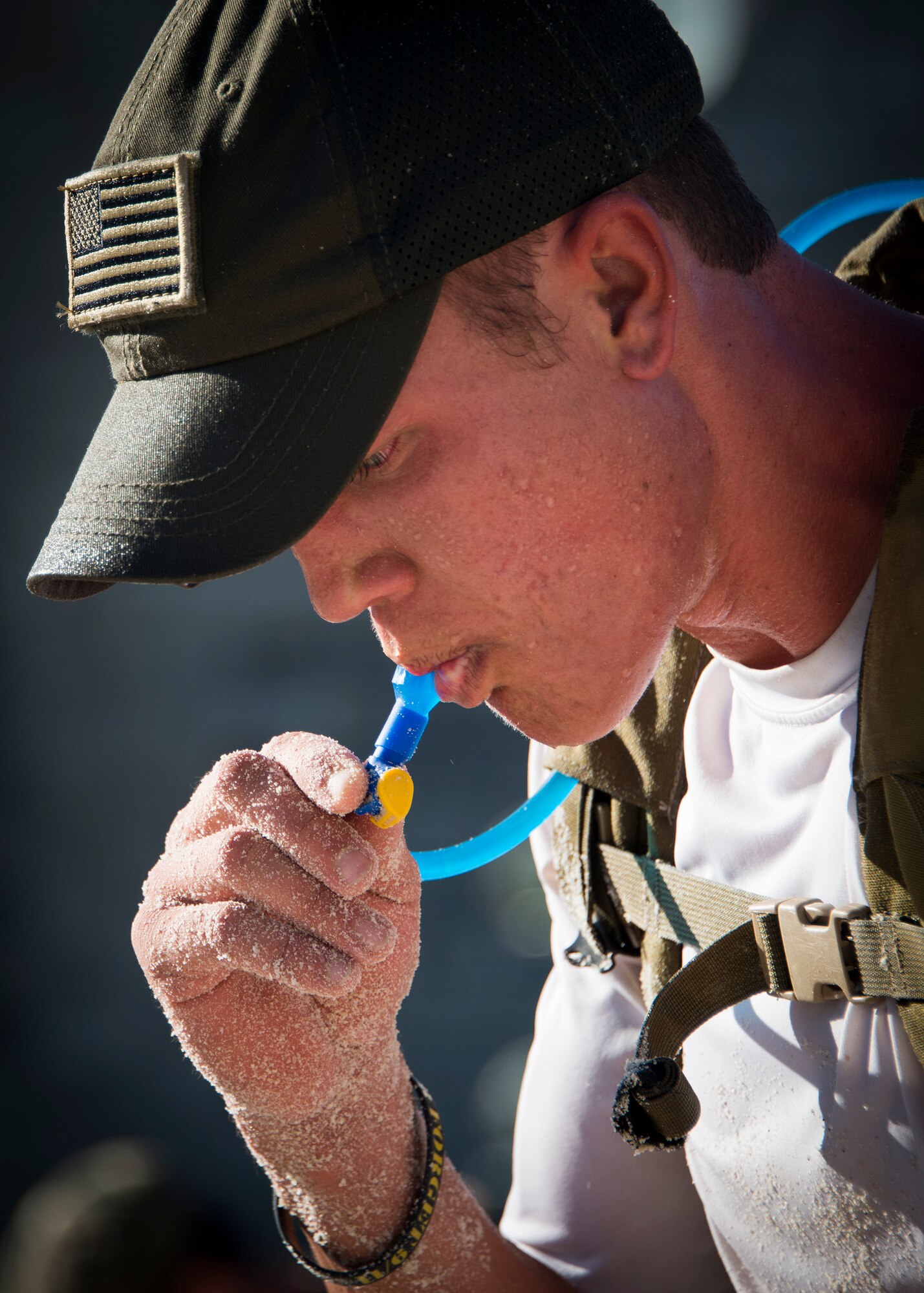 Colten Ederer hydrates during the GORUCK Cohesion Challenge Sept. 11, at Eglin Air Force Base, Fla.  This elite team-building event, led by a Special Forces veteran, featured military inspired challenges and missions.  Only 24 out of the original 27 completed all obstacles.  Eglin is the fifth base to complete the Team Cohesion Challenge.  (U.S. Air Force photo/Tech. Sgt. Jasmin Taylor)