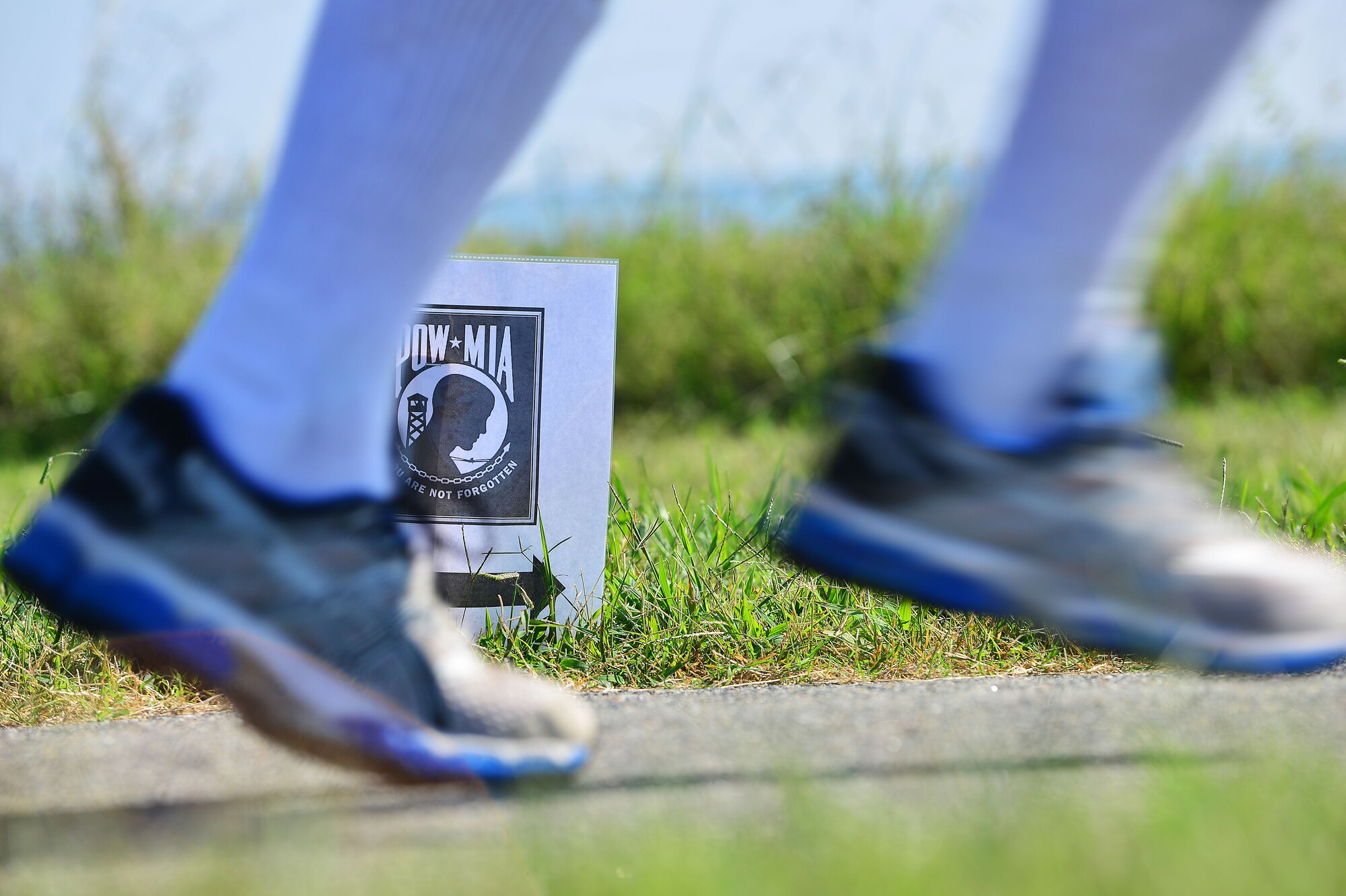 U.S. Air Force Airmen run during a POW/MIA 24-hour vigil at Langley Air Force Base, Va., Sept. 16, 2014. After the run, a recognition ceremony was held at the Langley POW/MIA memorial to honor our nations POW/MIA Service members. (U.S. Air Force photo by Staff Sgt. Antoinette Gibson/Released)