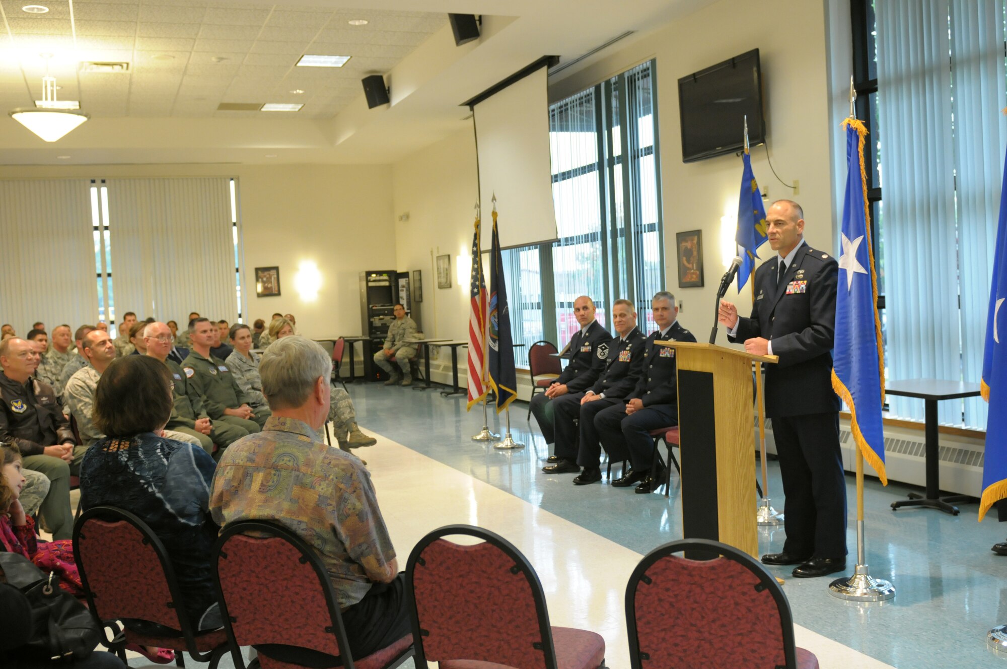 Lt. Col. Jeffrey Hedges speaks to the audience after assuming command of the 109th Mission Support Group during a change of command ceremony Sept. 13, 2014, at Stratton Air National Guard Base, N.Y. Hedges served as the 109th Logistics Readiness Squadron commander before taking the position as MSG commander. (U.S. Air National Guard photo by Master Sgt. William Gizara/Released)