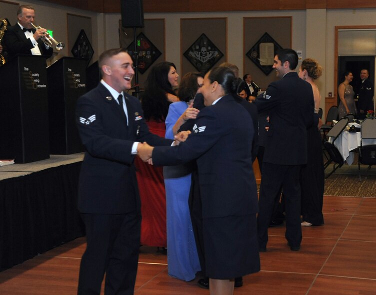 Team Malmstrom members dance to live music during the 2014 Air Force Ball Sept. 13. Approximately 340 people attended the event at the Grizzly Bend. This year’s theme was “Land of the Free, Because of the Brave.” (U.S. Air Force photo/Airman 1st Class Joshua Smoot)