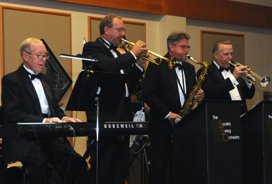 The Society Swing Orchestra provided live music representing compositions spanning the 1930s through the 1960s at the 2014 Air Force Ball Sept. 13. Musical director Jay Constantino on trumpet, center, is a former member of the U.S. Air Force Band. Approximately 340 people attended the event at the Grizzly Bend. (U.S. Air Force photo/Airman 1st Class Joshua Smoot)