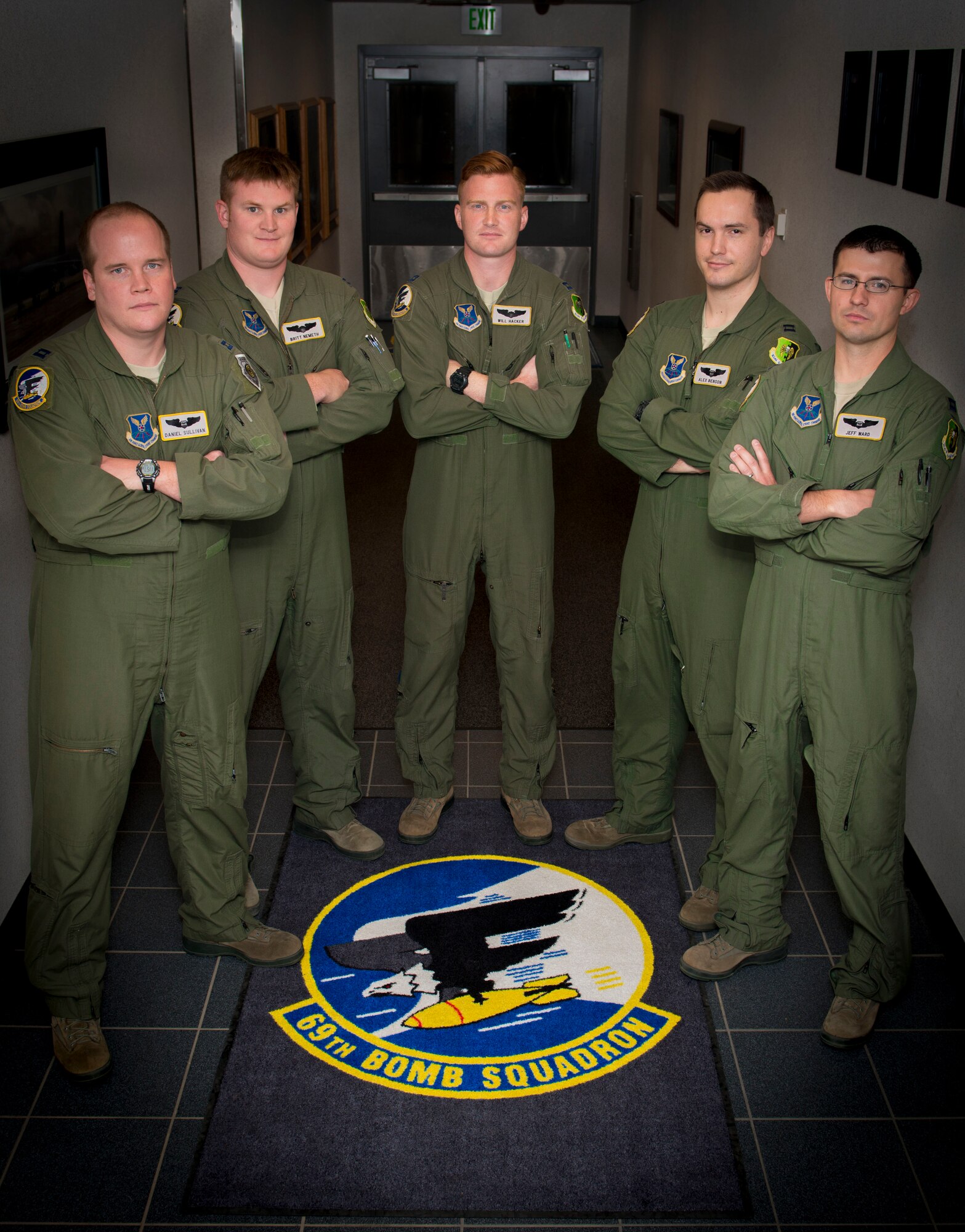 Members of the 69th Bomb Squadron’s Air Force Global Strike Challenge team pose for a group photo at Minot Air Force Base, N.D., Sept. 9, 2014. Their portion of the GSC consists of competing against other bomb squadrons to see who can most accurately drop bombs on target. (U.S. Air Force photo/Airman 1st Class Sahara L. Fales)