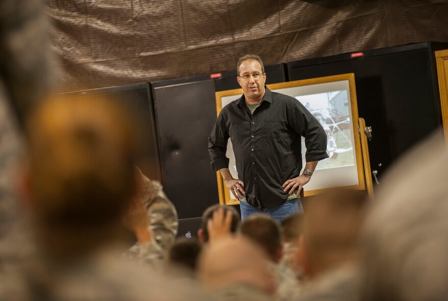 Guest speaker Michael Gershe speaks to the Civil Engineer Squadron on Minot Air Force Base, N.D., Sept. 12, 2014. Gershe gave a presentation called The Magic of Life, which is an alcohol awareness and anti-drunk driving program. Gershe performed multiple times at the base theater throughout the week and also hosted an educational program geared toward middle school and high school kids. (U.S. Air Force photo/Airman 1st Class Apryl Hall)