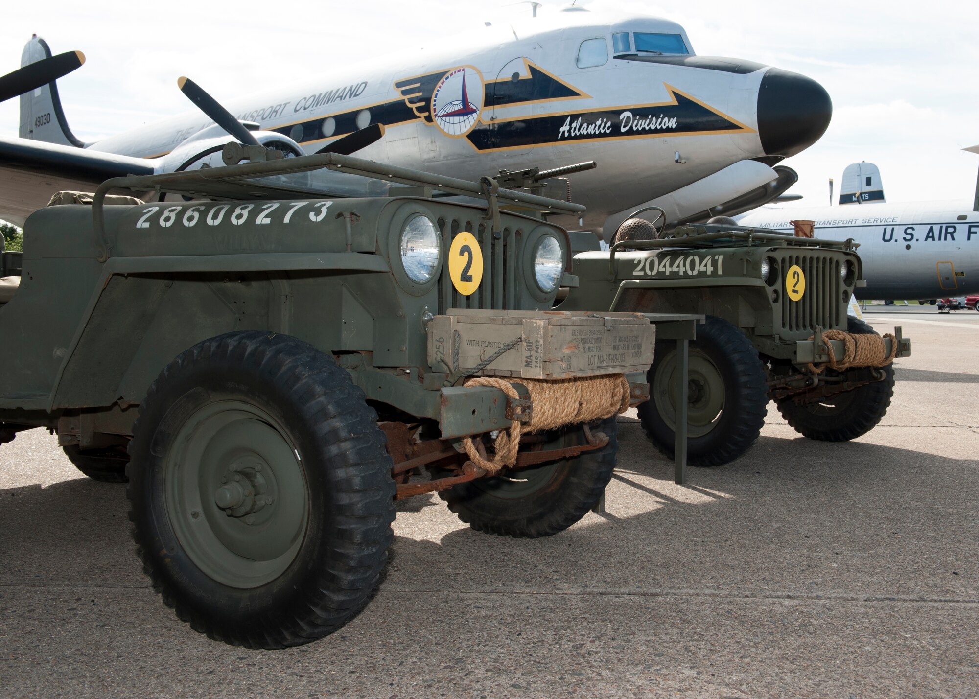 A 1947 Willys Jeep CJ2A, owned by Brian Lewis, left, and a 1946 Willys Jeep CJ2A, owned by John Zish, sit on display at the 2014 Super Street car and bike show Sept. 14, 2014, at the Air Mobility Command Museum on Dover Air Force Base, Del. These Jeeps were entered into the antique category of the competition. (U.S. Air Force photo/Airman 1st Class Zachary Cacicia)