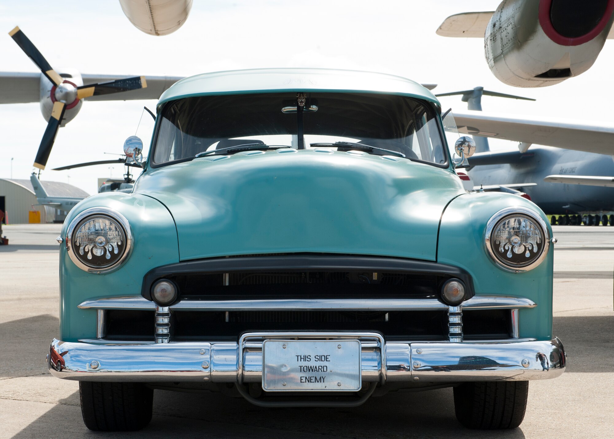 A 1950 Chevrolet, owned by Dean Bynam, sits on display at the 2014 Super Street car and bike show Sept. 14, 2014, at the Air Mobility Command Museum on Dover Air Force Base, Del. The cars and bikes at this event sat on display underneath the wings of historic Air Force aircraft. (U.S. Air Force photo/Airman 1st Class Zachary Cacicia) 