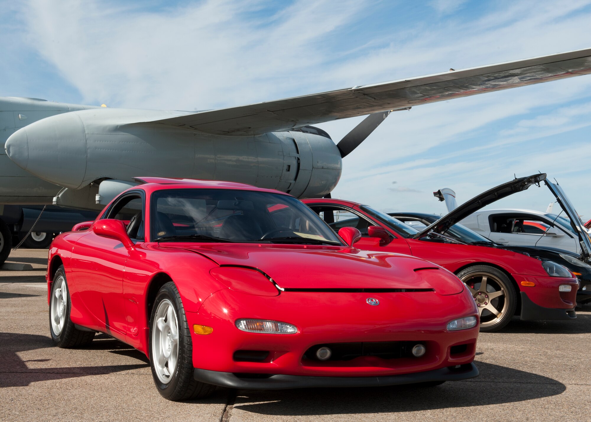 A 1993 Mazda RX-7, owned by Drew Vaughn, sits on display at the 2014 Super Street car and bike show Sept. 14, 2014, at the Air Mobility Command Museum on Dover Air Force Base, Del. A wide variety of cars could be seen on display at this event. (U.S. Air Force photos/Airman 1st Class Zachary Cacicia) 
