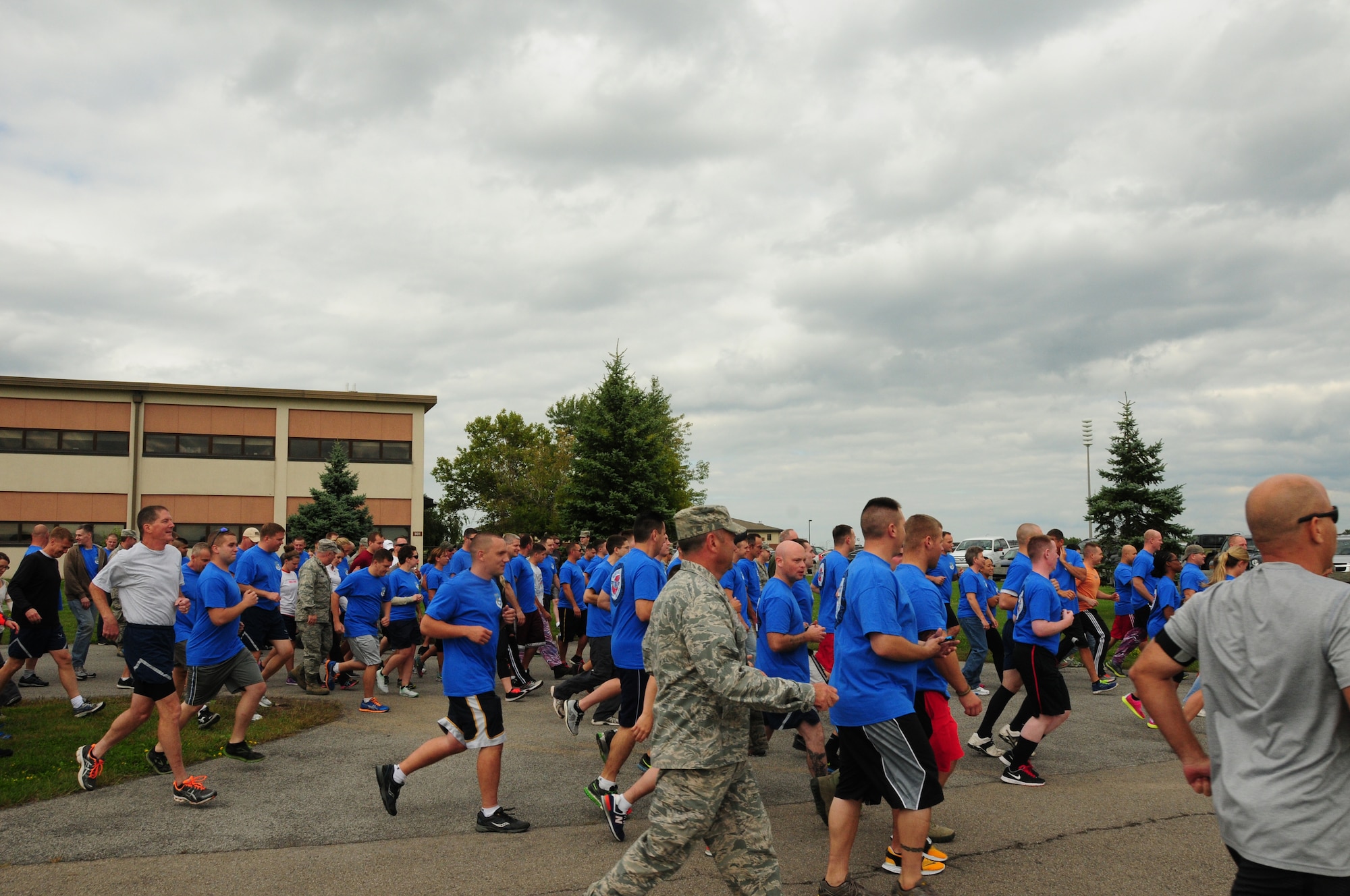107th unit members participate in the 5K Sexual Assault Prevention and Response program run at the Niagara Falls Reserve Station on Sept, 13, 2014. (U.S. Air National Guard Photo/Senior Airman Kayla Blake/Released)
