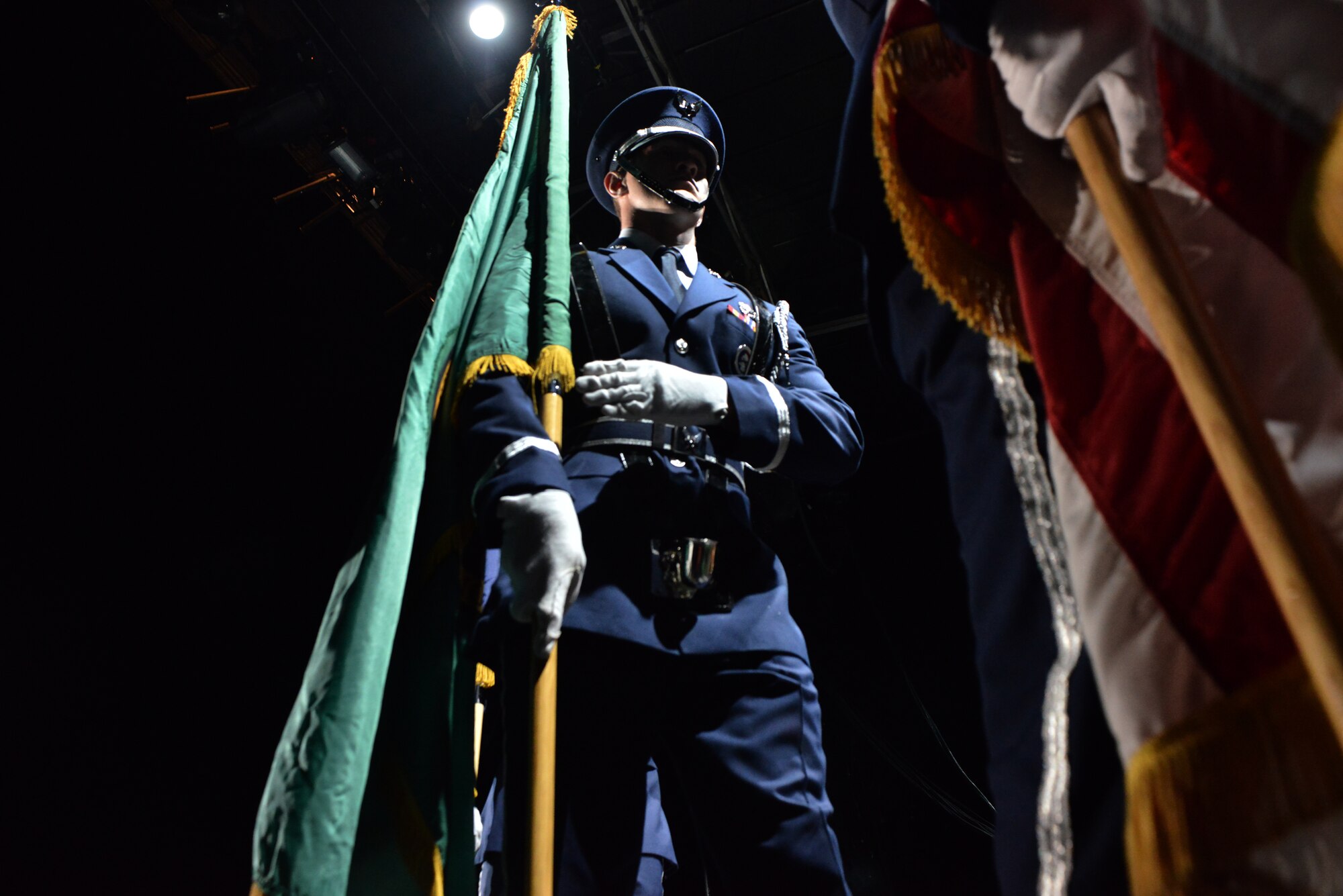Members from the Fairchild Air Force Base honor guard present the colors on stage for thousands of fans during the “Rock Hard at the Park” concert tour Sept. 11, 2014, in Post Falls, Idaho. The concert highlighted multiple rock bands and had a special patriotic ceremony to highlight Sept. 11. (U.S. Air Force photos by Staff Sgt. Alexandre Montes/Released)