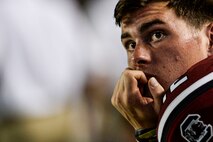 A University of South Carolina Gamecocks player watches the game against the East Carolina Pirates  at William-Brice Stadium in Columbia, S.C., Sept. 5, 2014. The Gamecocks defeated the Pirates with a score of 33 to 23. (US Air Force photo by Staff Sgt. Corey Hook/released)