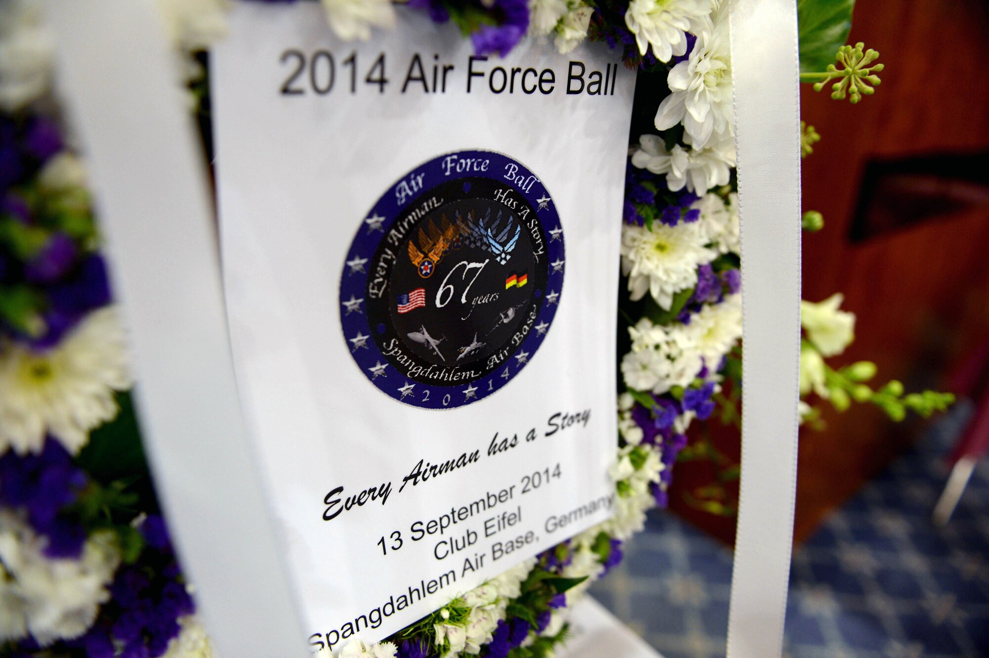 The program for the 2014 Air Force Ball is displayed at Spangdahlem Air Base, Germany, Sept. 13, 2014. Spangdahlem Airmen and their family members attended the ball, complete with food and entertainment. (U.S. Air Force photo by Airman 1st Class Timothy Kim/Released)