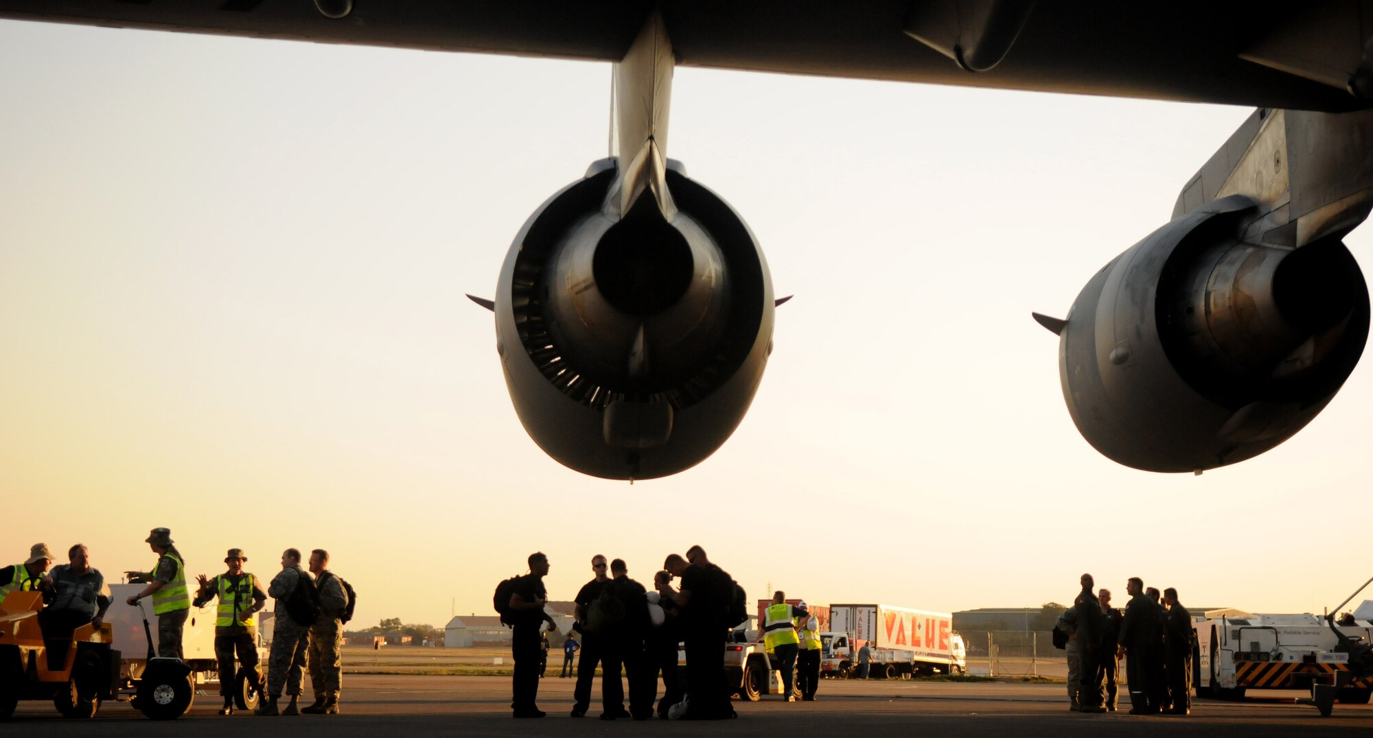 American and South African air and ground crews perform post-flight procedures on a New York Air National Guard C-17 Globemaster III Sept. 15, 2014, after landing at Waterkloof Air Force Base, Pretoria, South Africa. The aircraft and crew are part of the United States presence at the Africa Aerospace & Defence Expo 2014, along with the U.S. Army's Golden Knights parachute demonstration team, U.S. Air Forces in Europe band Wings of Dixie and a C-130J Super Hercules from Ramstein Air Base, Germany. (U.S. Air Force photo by Tech. Sgt. Austin M. May/Released)