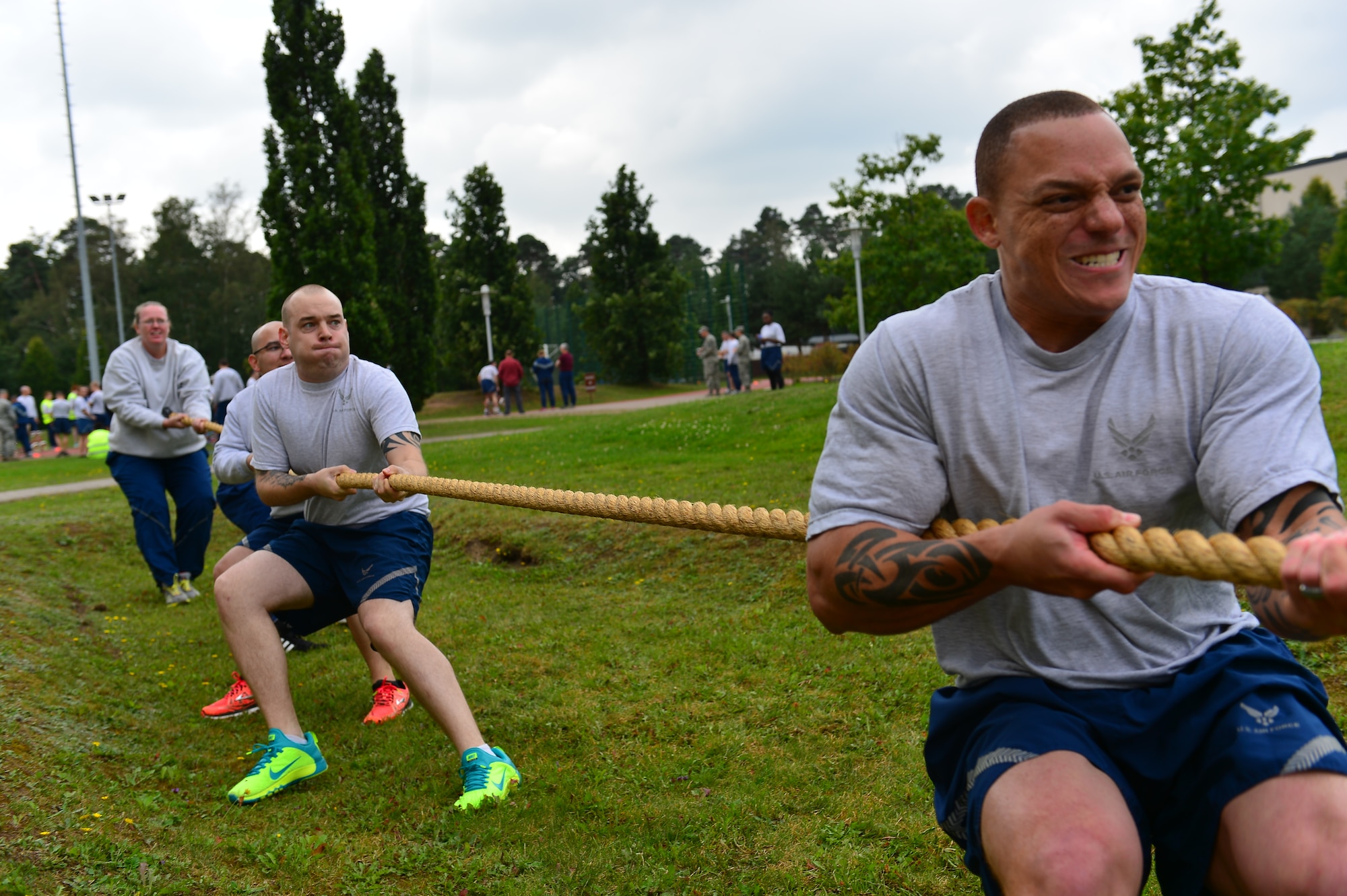 The 786th Force Support Squadron tug-of-war team, tug with all their strength during Resilience Day on Ramstein Air Base, Germany, Sept. 11, 2014.  This year's Resilience Day featured a commander's challenge compiled of athletic events to challenge Airmen.  The challenge included; 3-on-3 basketball tournament, 6-on-6 volleyball match, dodge ball, soccer, 1 pitch softball, 1 pitch kickball, 7-on-7 flag football, hula-hoop competition, 3 legged race, 400M tricycle team relay, Humvee push, tug-of-war, golf challenge and concluded with a Colonels vs. Chiefs softball game.  (U.S. Air Force photo/Tech. Sgt. Daylena S. Ricks)