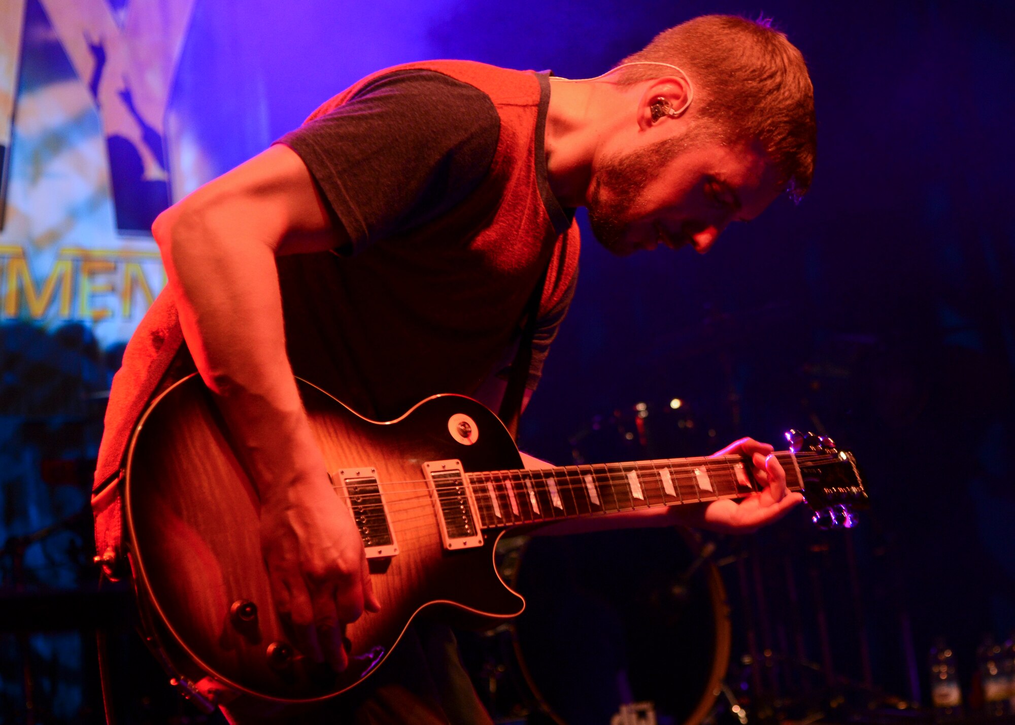Dave Tirio, guitarist for the Plain White T’s, performs for fans Sept. 12, 2014, at the Northside Fitness Center on RAF Mildenhall, England. The band performed for hundreds of fans during the event which was sponsored by Navy Entertainment and Armed Forces Entertainment. (U.S. Air Force photo/ Senior Airman Victoria H. Taylor/Released)