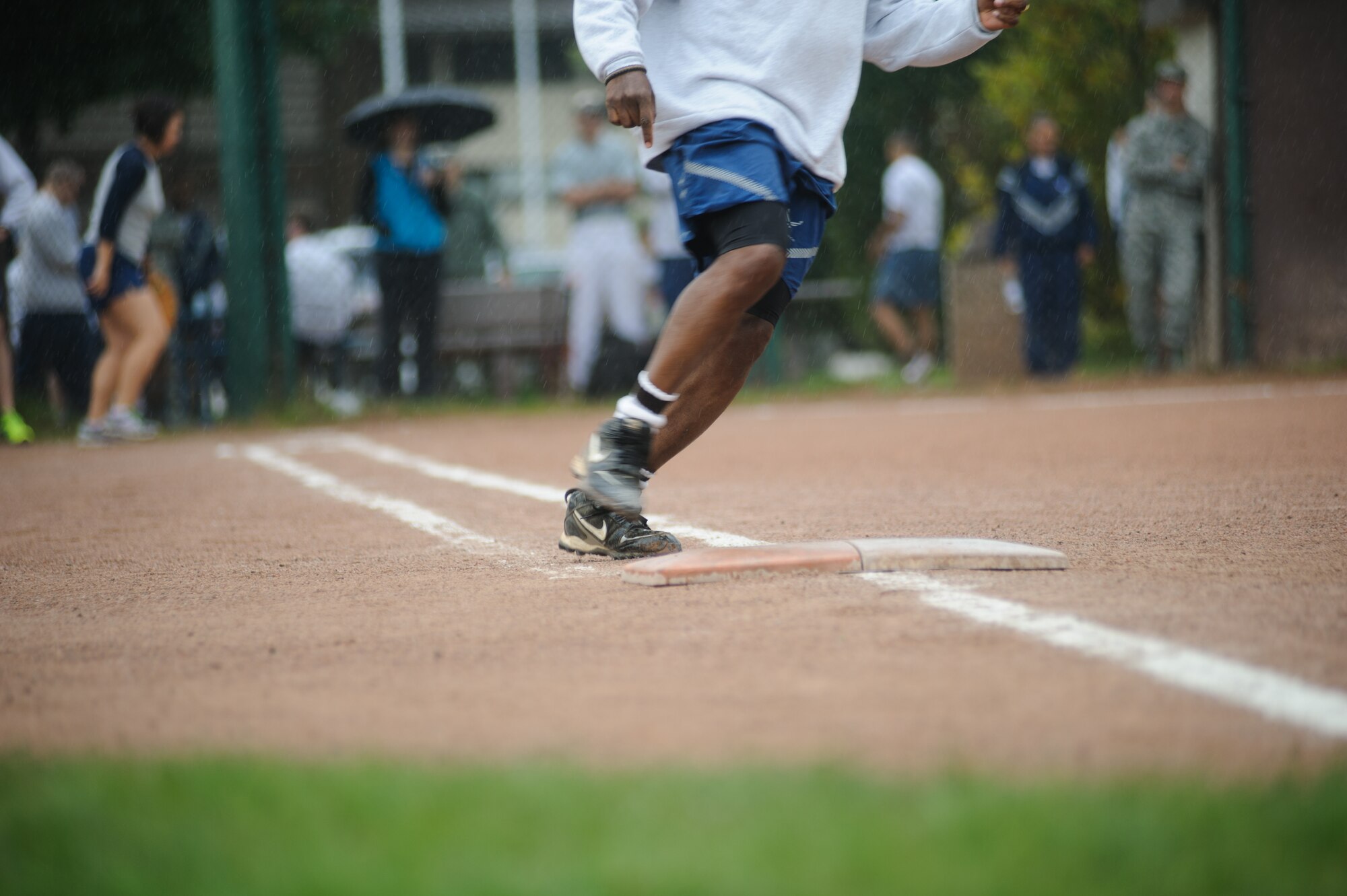 An eagle runs past 1st base during the chiefs vs eagles games Sept. 11, 2014 at Ramstein Air Base, Germany. The softball game was part of a larger RUfit Resilience Day with the chiefs coming out on top 10-7. (U.S. Air Force photo/ Senior Airman Jonathan Stefanko)