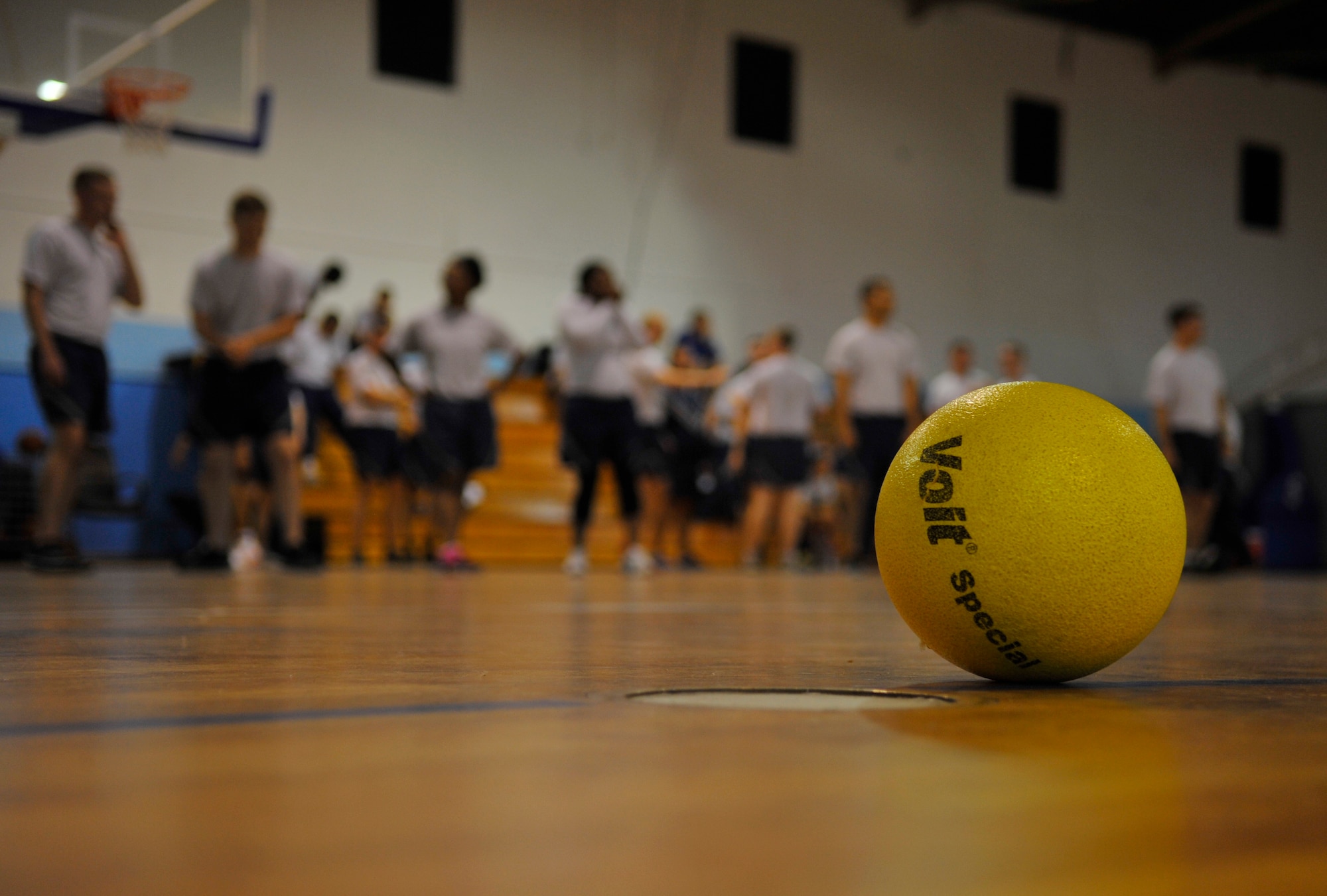 Airmen form up in their teams before the first dodgeball game during Resilience Day on Sept. 11, 2014 at Ramstein Air Base, Germany. The day gave Airmen the chance to get out of the office and build camaraderie with others. (U.S. Air Force photo/Airman Larissa Greatwood)