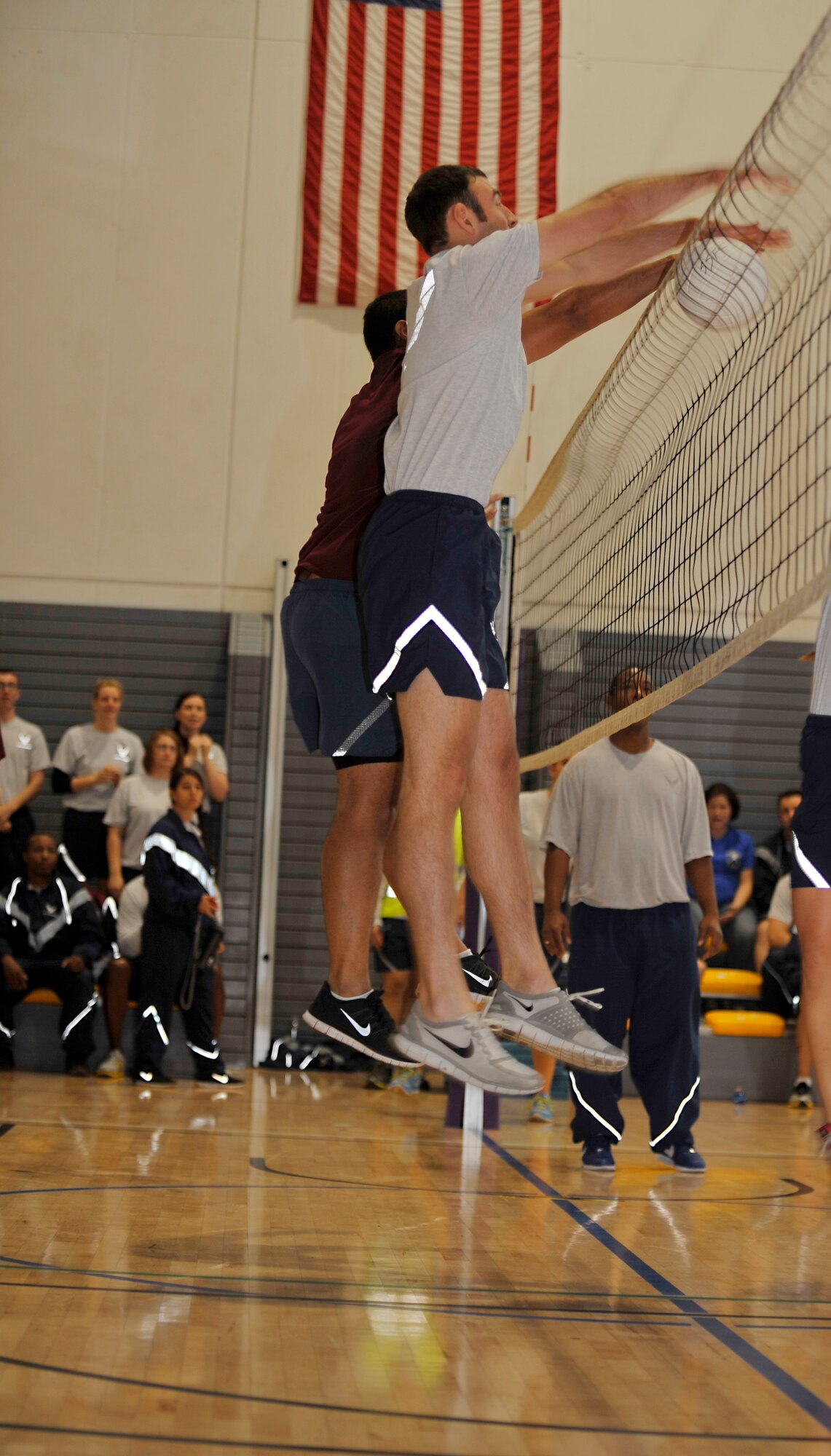 Airmen compete in volleyball teams during Resilience Day on Sept. 11, 2014 at Ramstein Air Base, Germany. The day offered a variety of sports to include volleyball, basketball and dodgeball to give Airmen the opportunity to compete with and against each other as healthy competition. (U.S Air Force photo/Airman Larissa Greatwood)