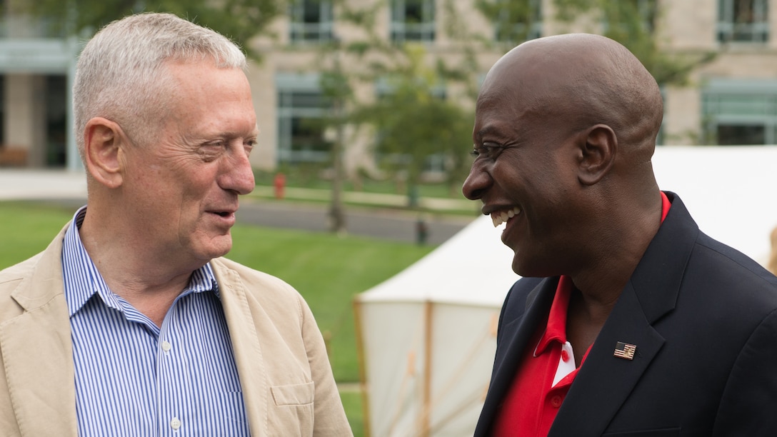 Retired Gen. James Mattis talks with the 16th Sergeant Major of the Marine Corps Carlton Kent at the No Greater Sacrifice 2014 Freedom Award Family Day, Washington D.C., September 13, 2014. Mattis is this years Freedom Award recipient and Kent was last years recipient. (U.S. Marine Corps photo by Sgt. Melissa Karnath/Released)