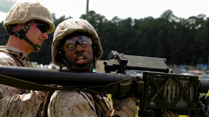 Sgt. Rico L. Rose clears the back-blast area during a simulated PL-87 Stinger missile shoot during a 2nd Low Altitude Air Defense Battalion’s section leader course and team leader course at Marine Corps Air Station Cherry Point, N.C., Sept. 11, 2014. Rose is a gunner with the battalion and a native of Appomattox, Va.